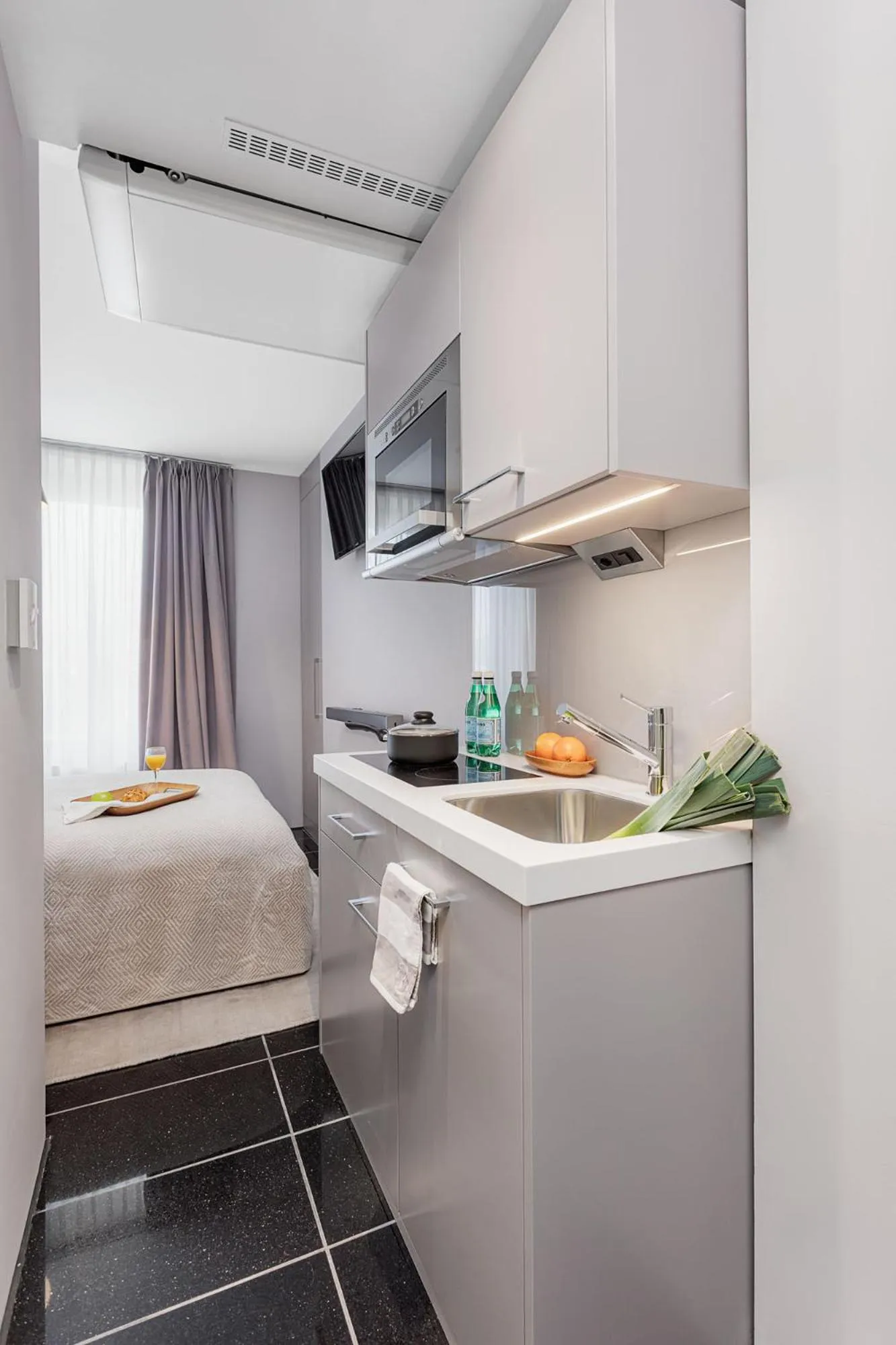 Kitchen or kitchenette in VISIONAPARTMENTS Lucerne - contactless check-in