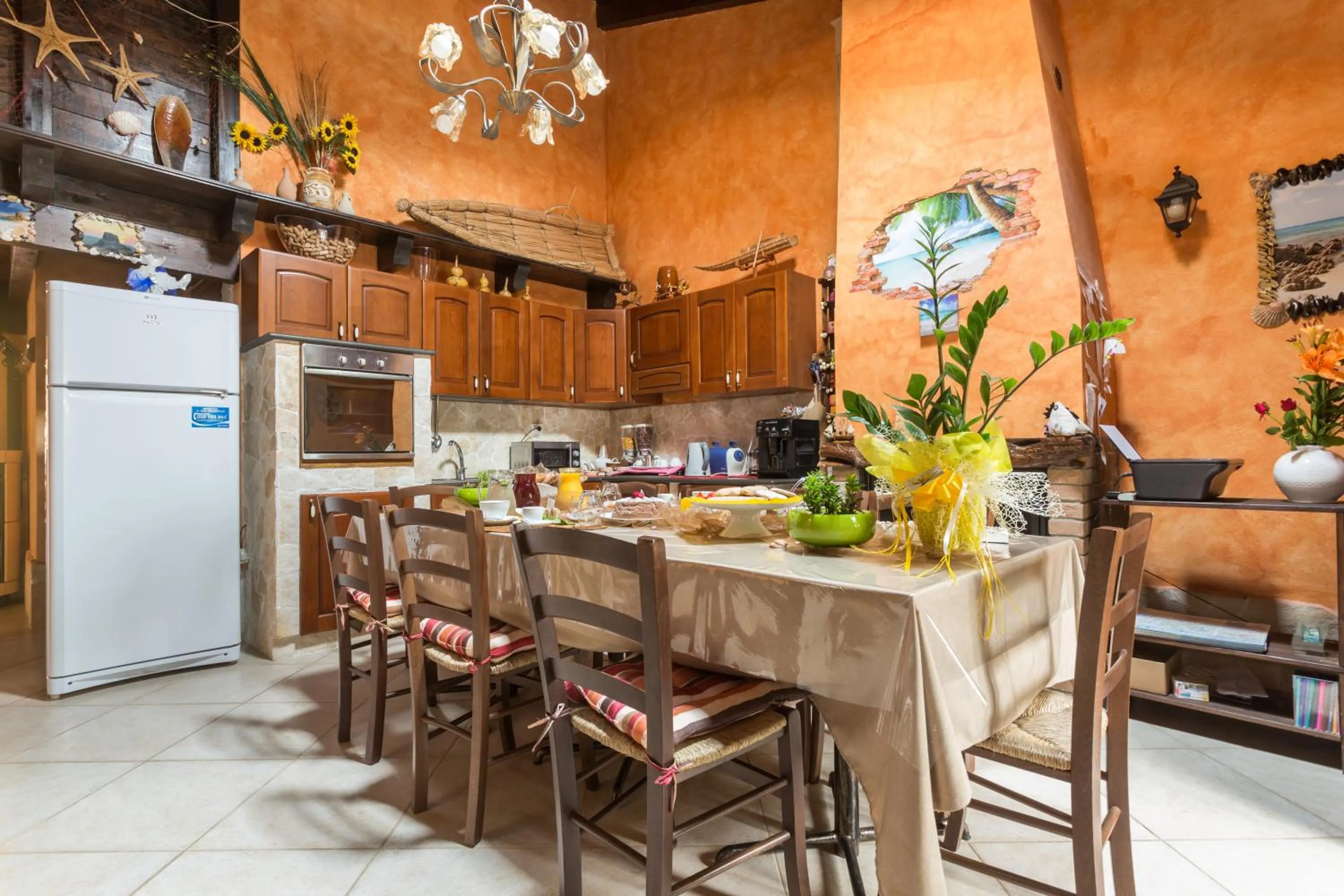 Communal lounge/ TV room in Affittacamere Shardana