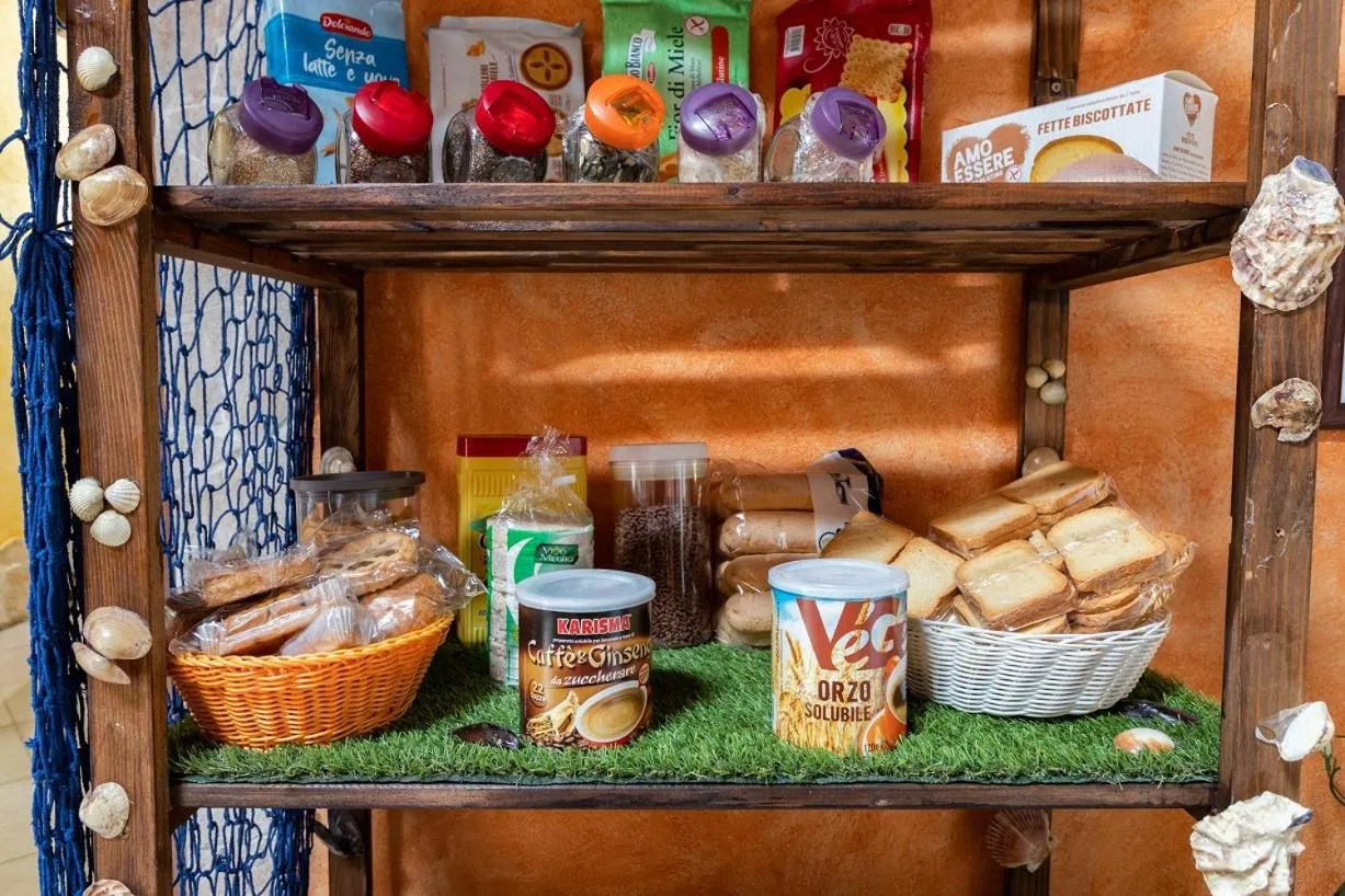 Kitchen or kitchenette in Affittacamere Shardana