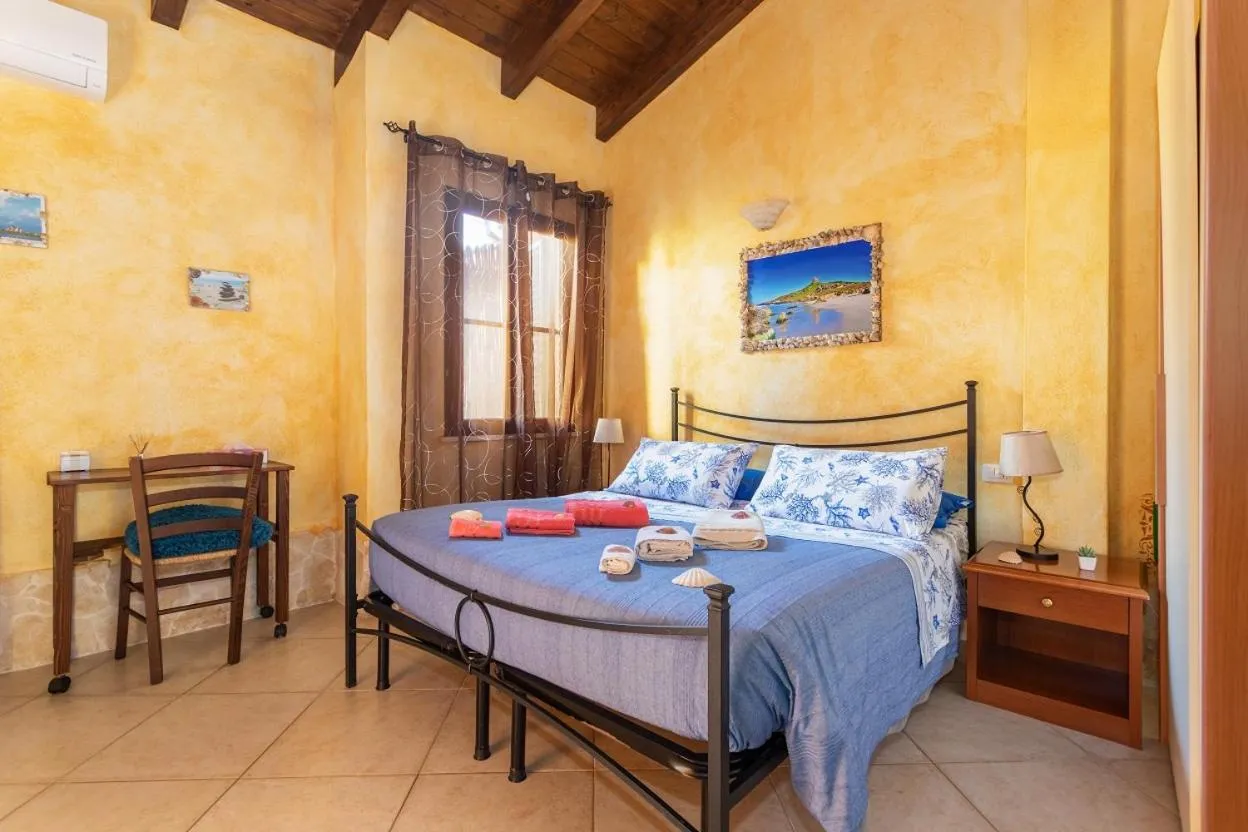 Bed in Affittacamere Shardana