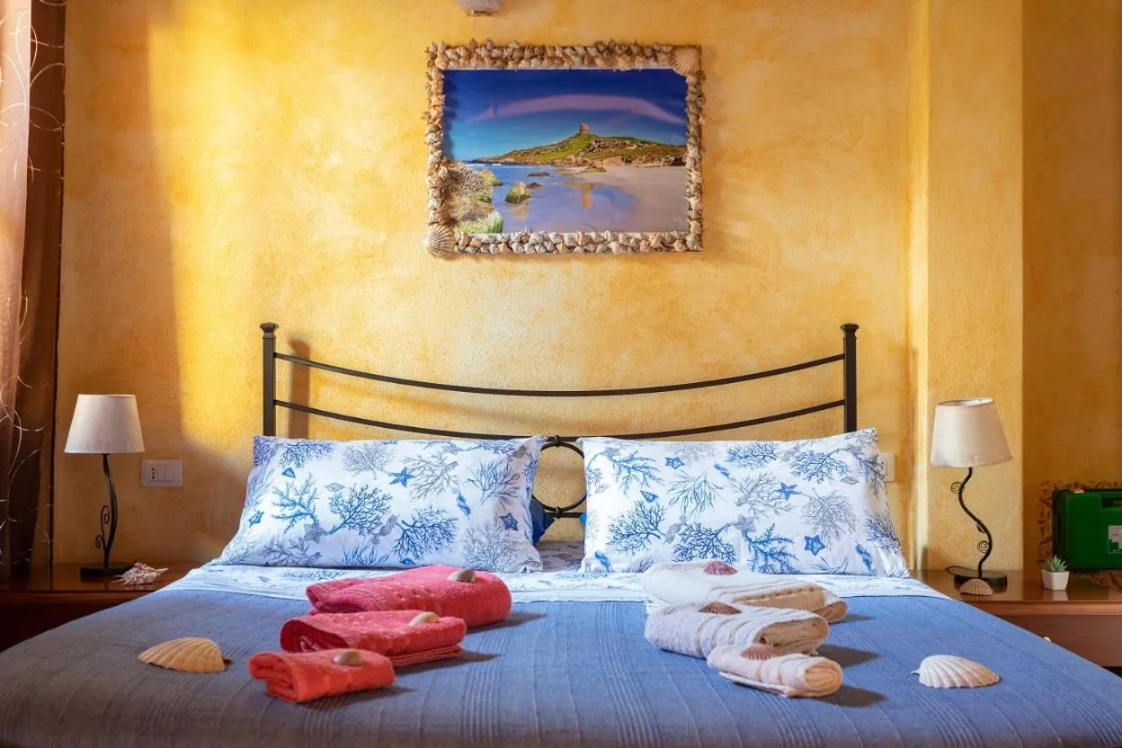 Bed in Affittacamere Shardana