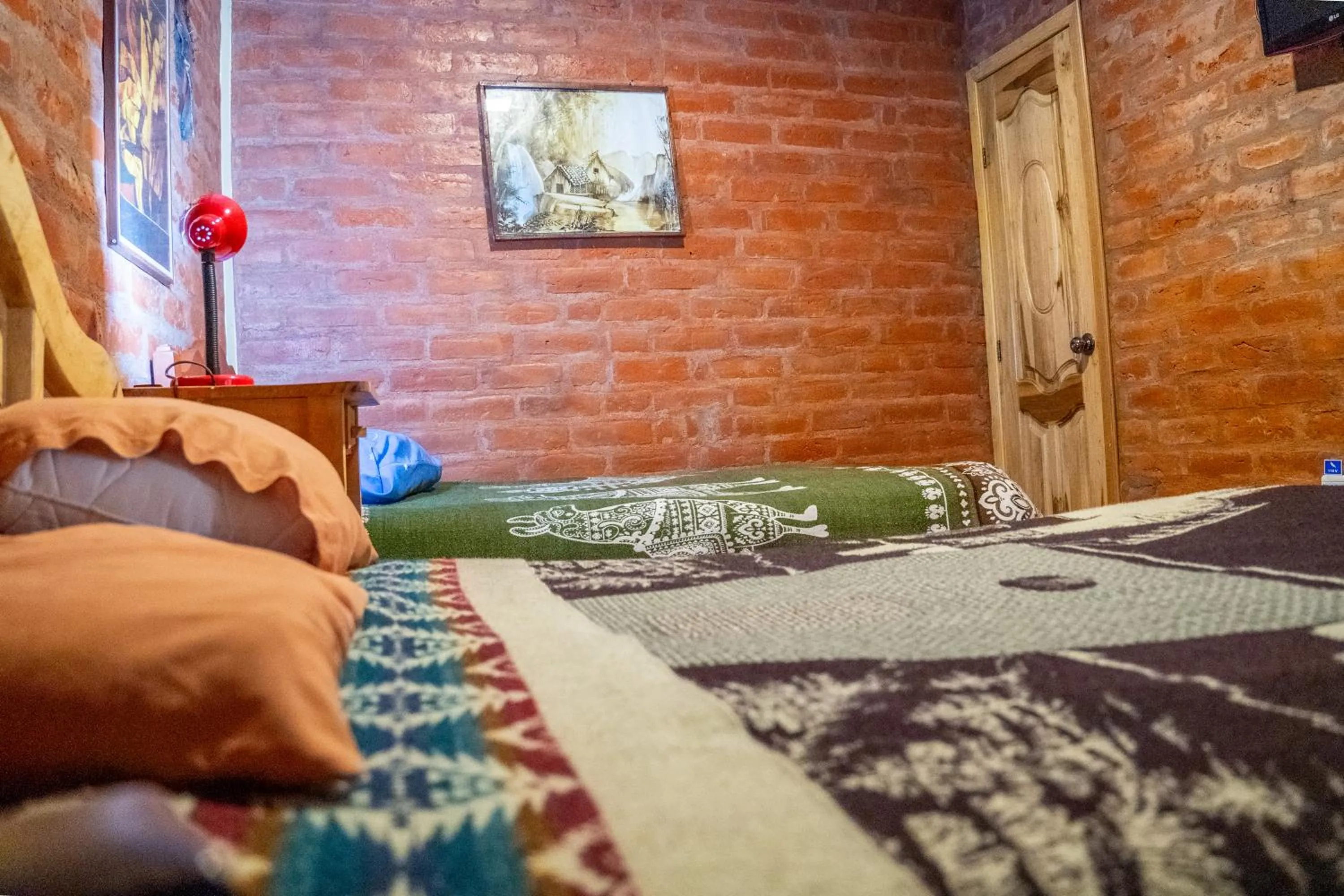 Photo of the whole room, Bed in Hostal La Casa Amarilla City