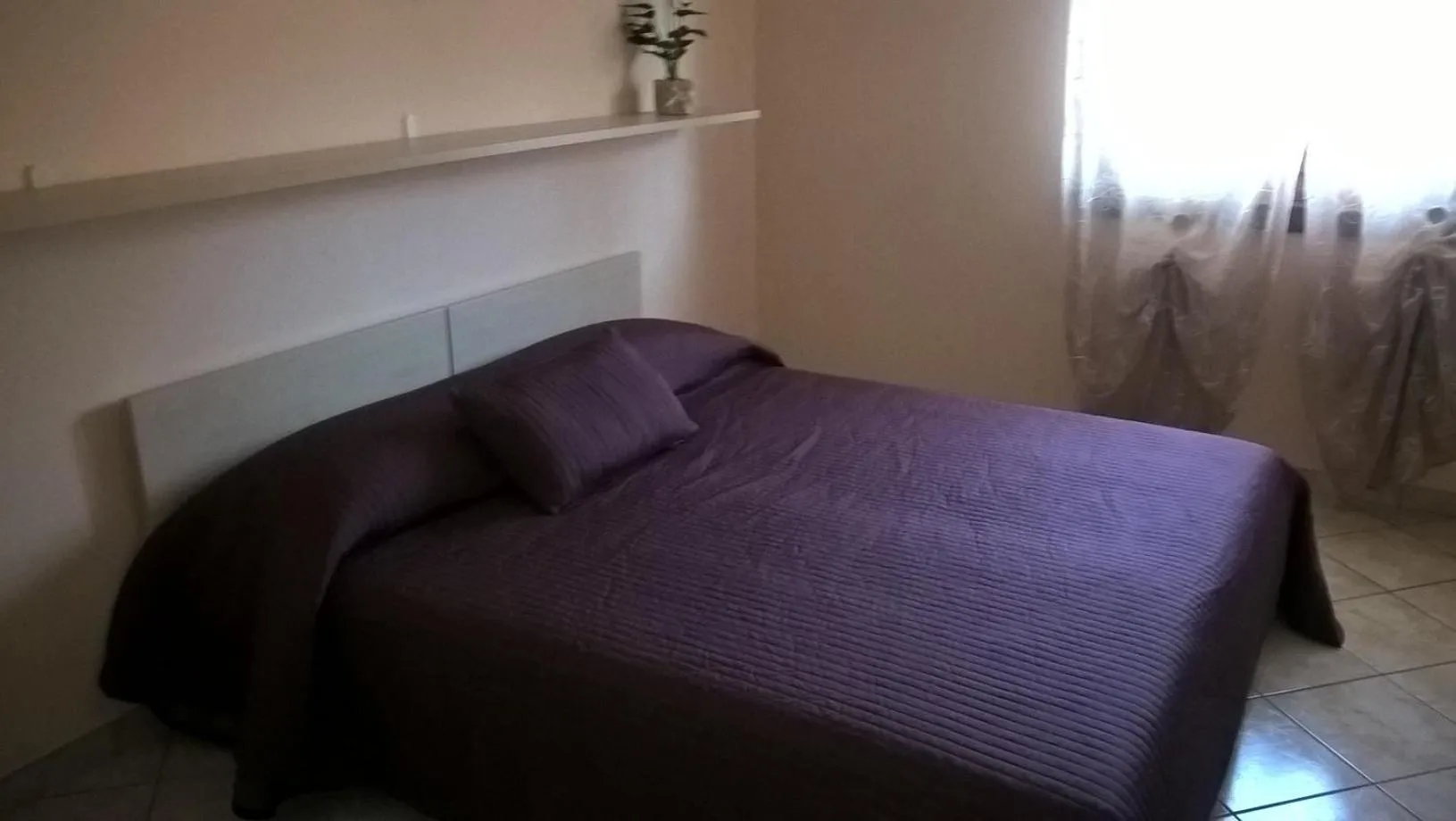 Bed in Suiteroom&Apartment flat fiumicino