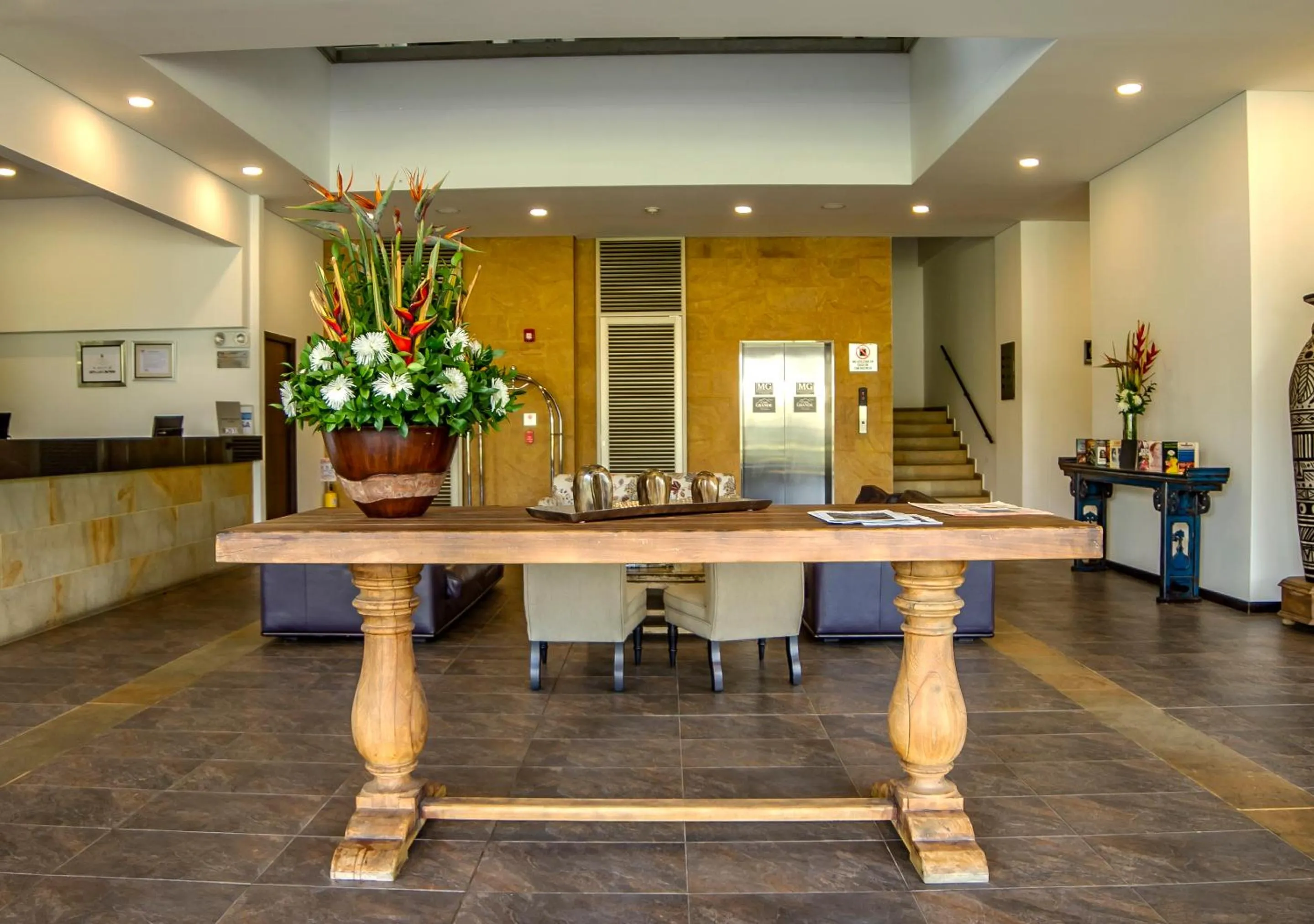 Lobby or reception in MG Hotels & Suites