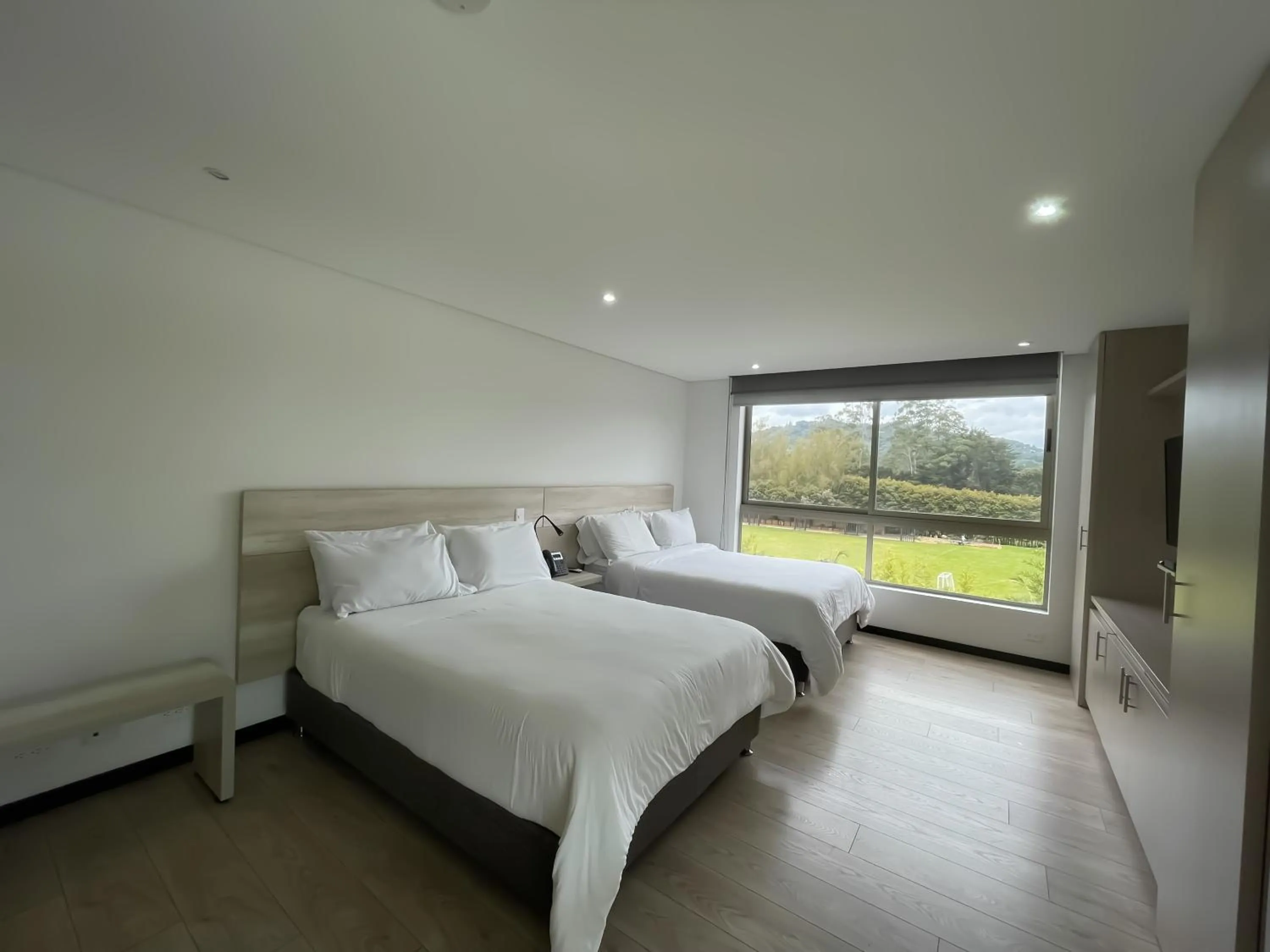 Bed in MG Hotels & Suites