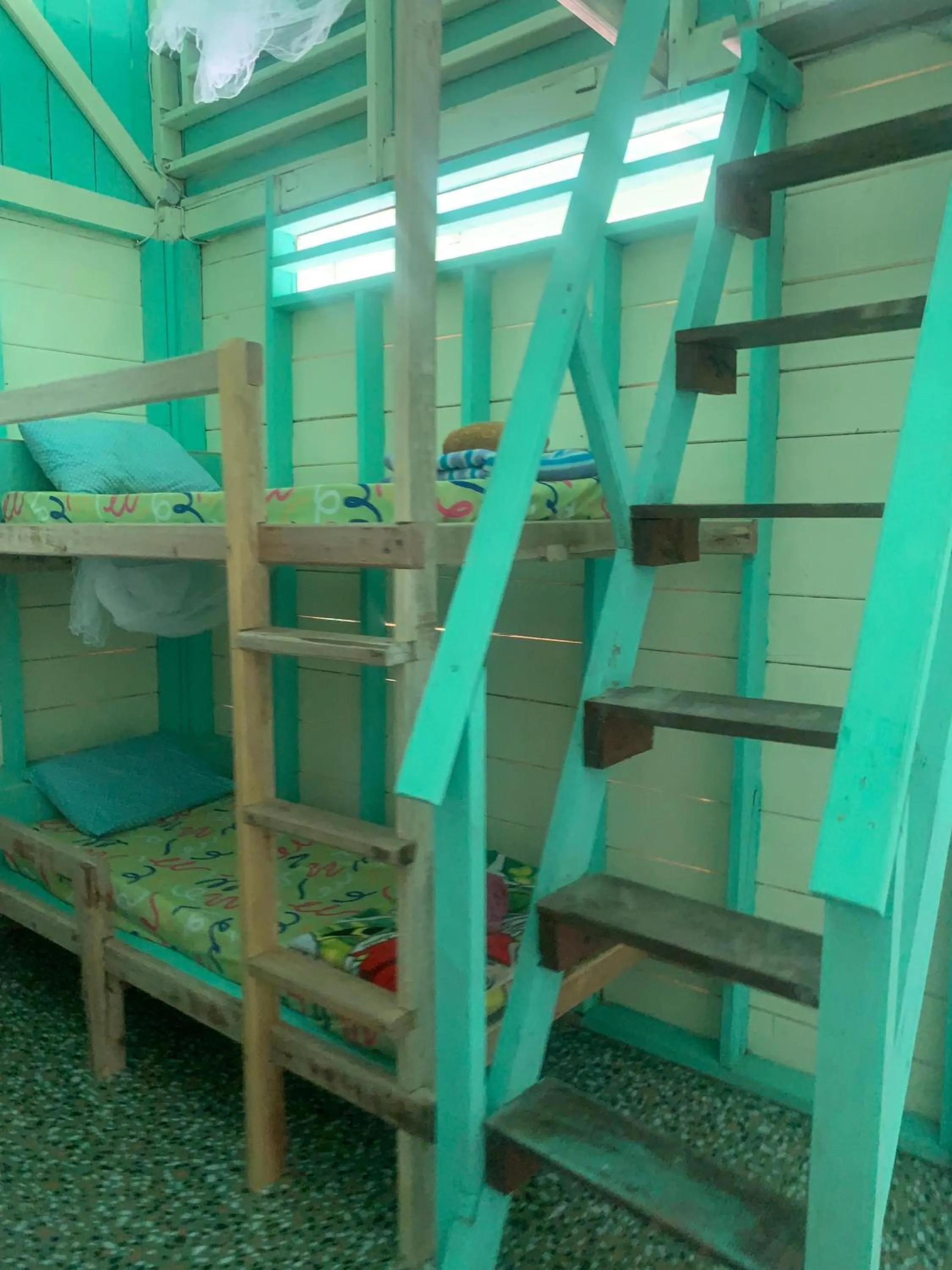 Bed in Ricky's Beach House