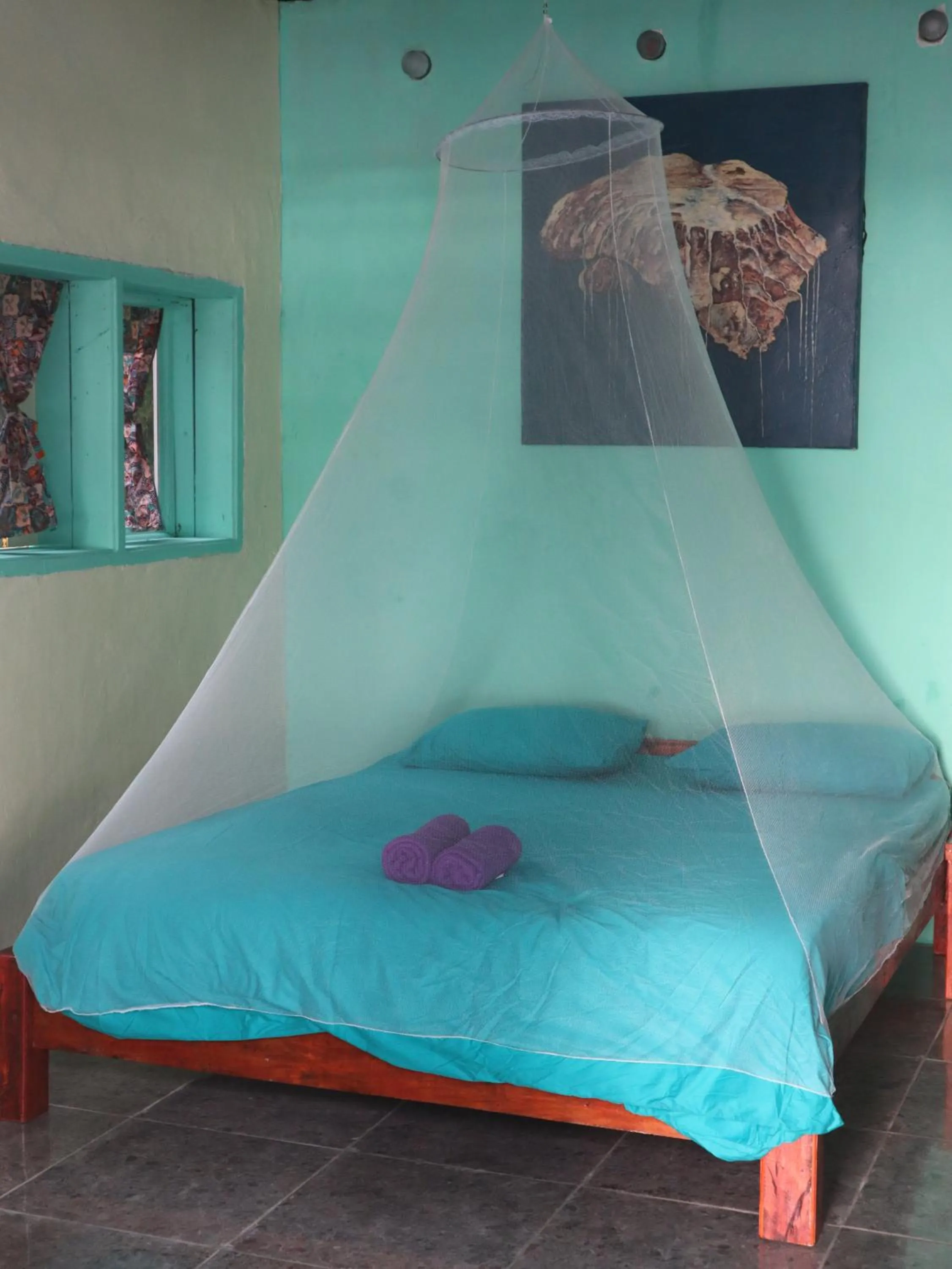 Bed in Ricky's Beach House