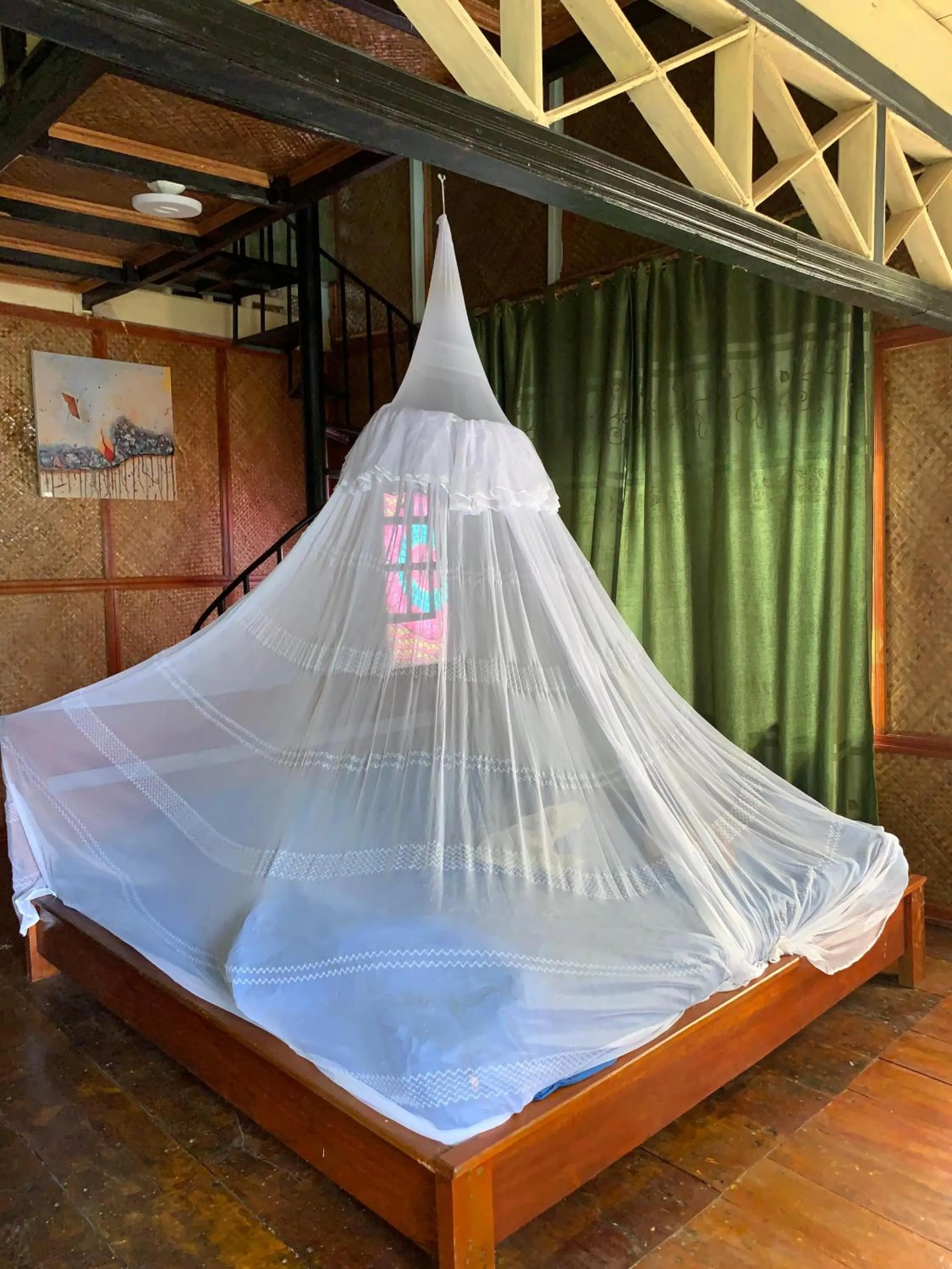 Bed in Ricky's Beach House