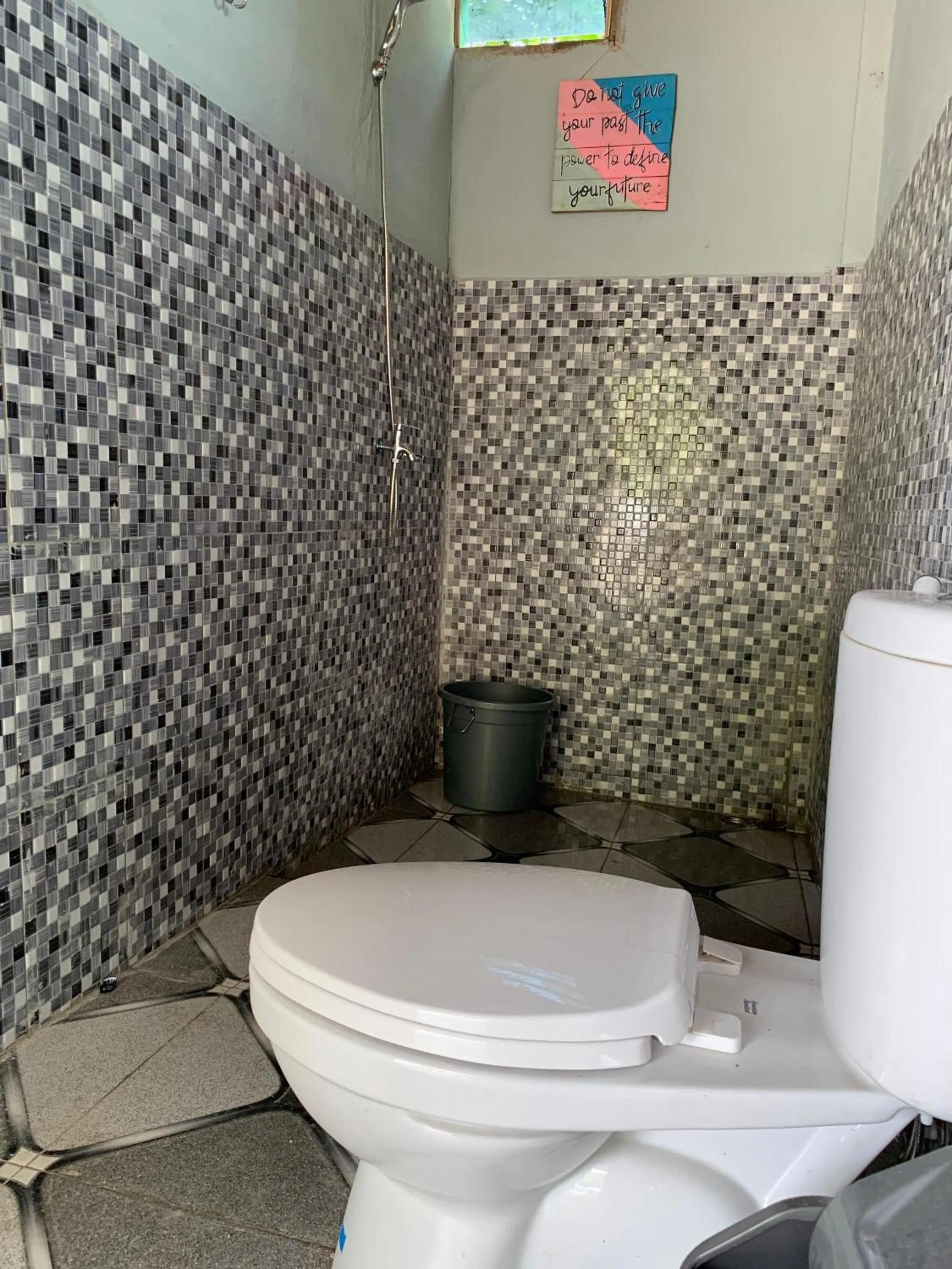 Toilet in Ricky's Beach House