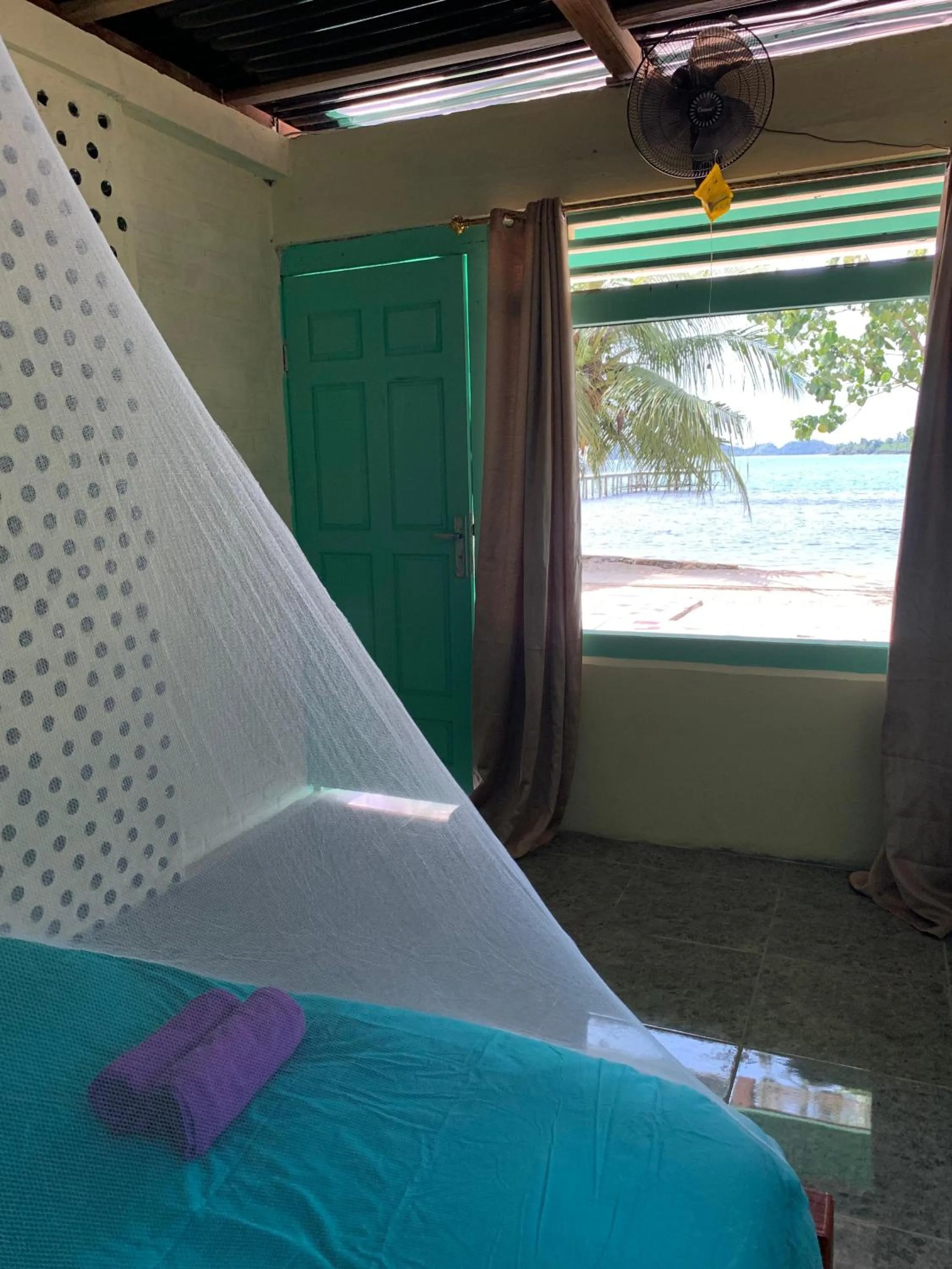 Bed in Ricky's Beach House