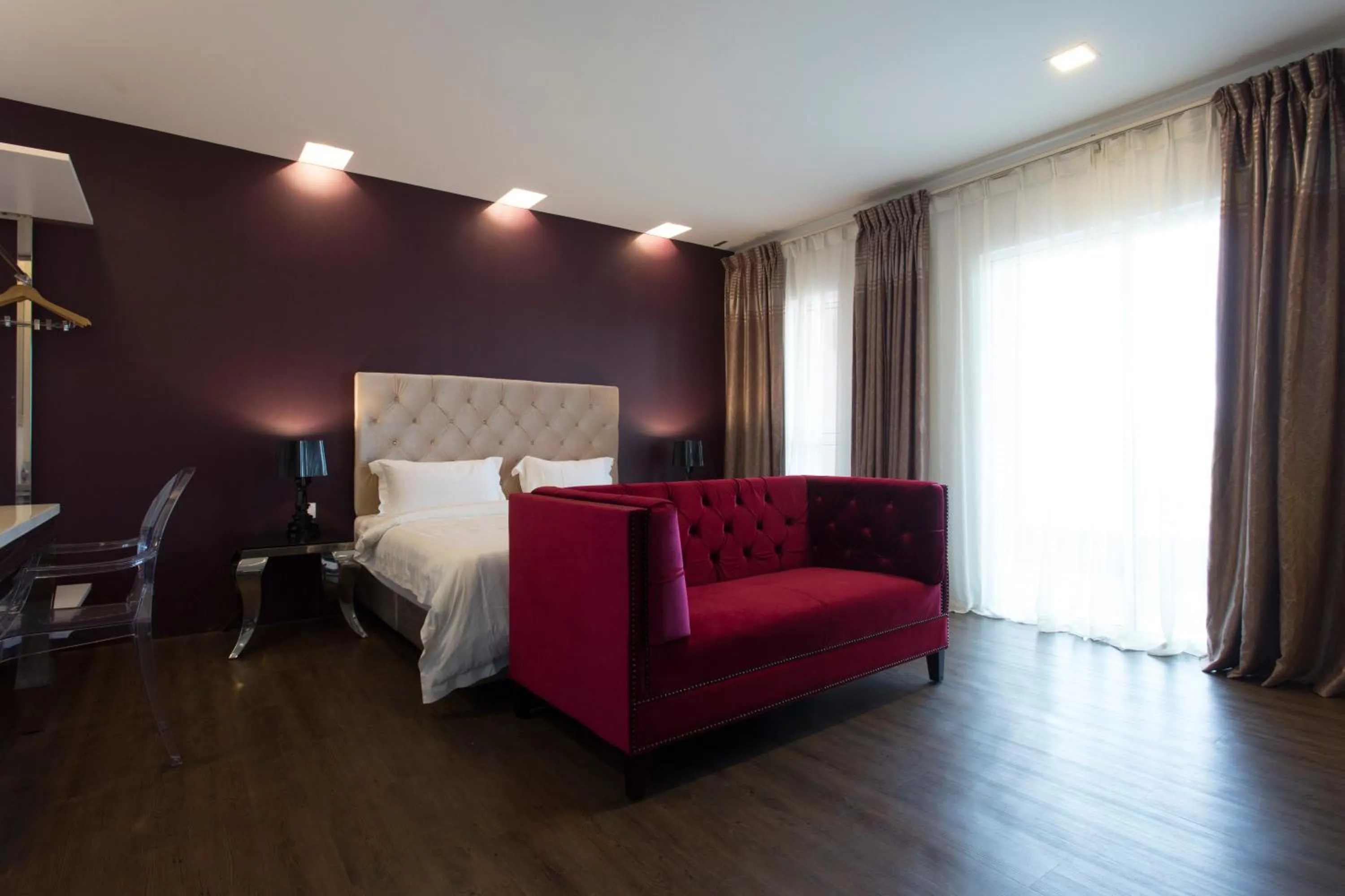 Living room, Bed in Aloha Hotel SDN BHD