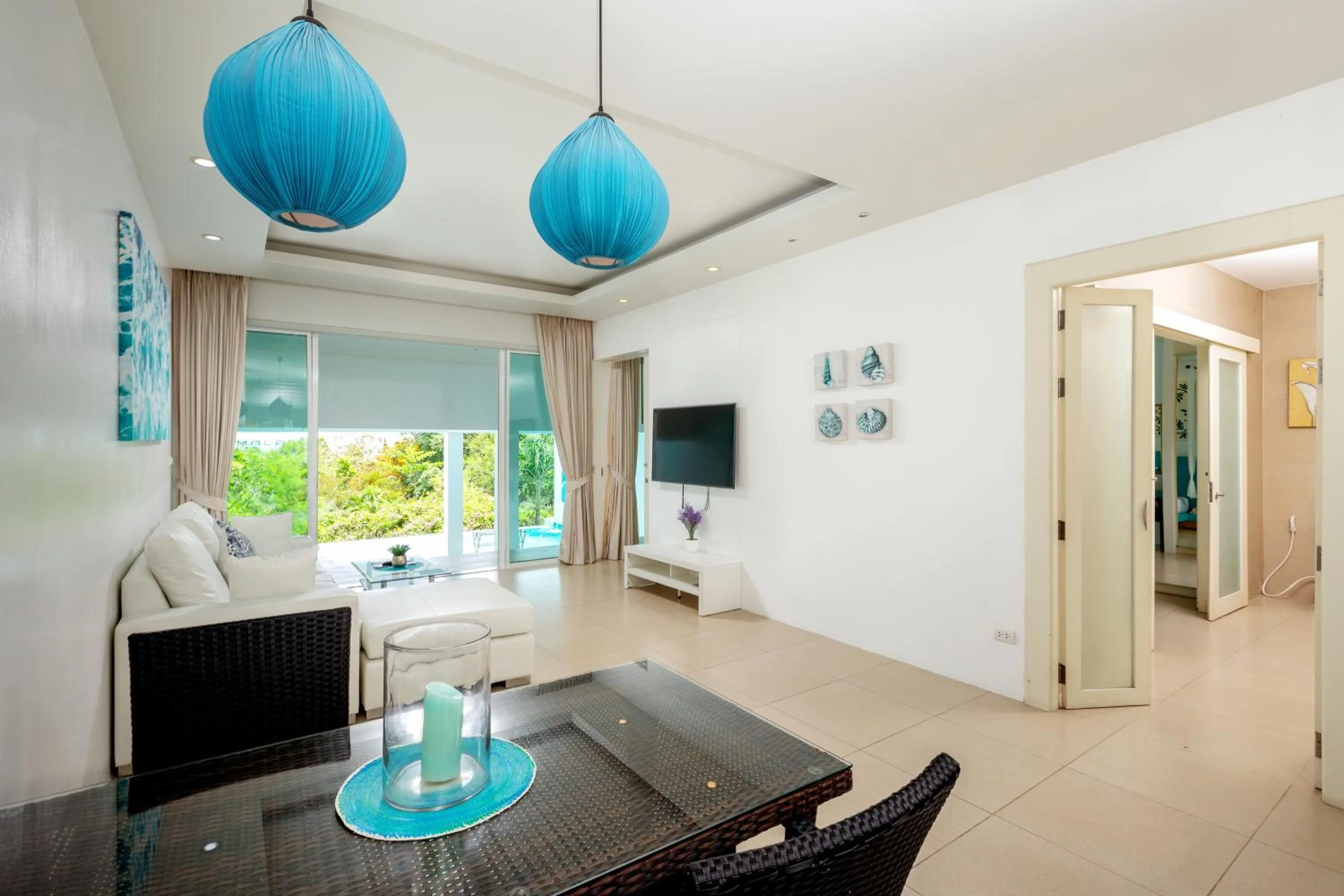 Living room in Amala Grand Bleu Resort Hilltops - SHA