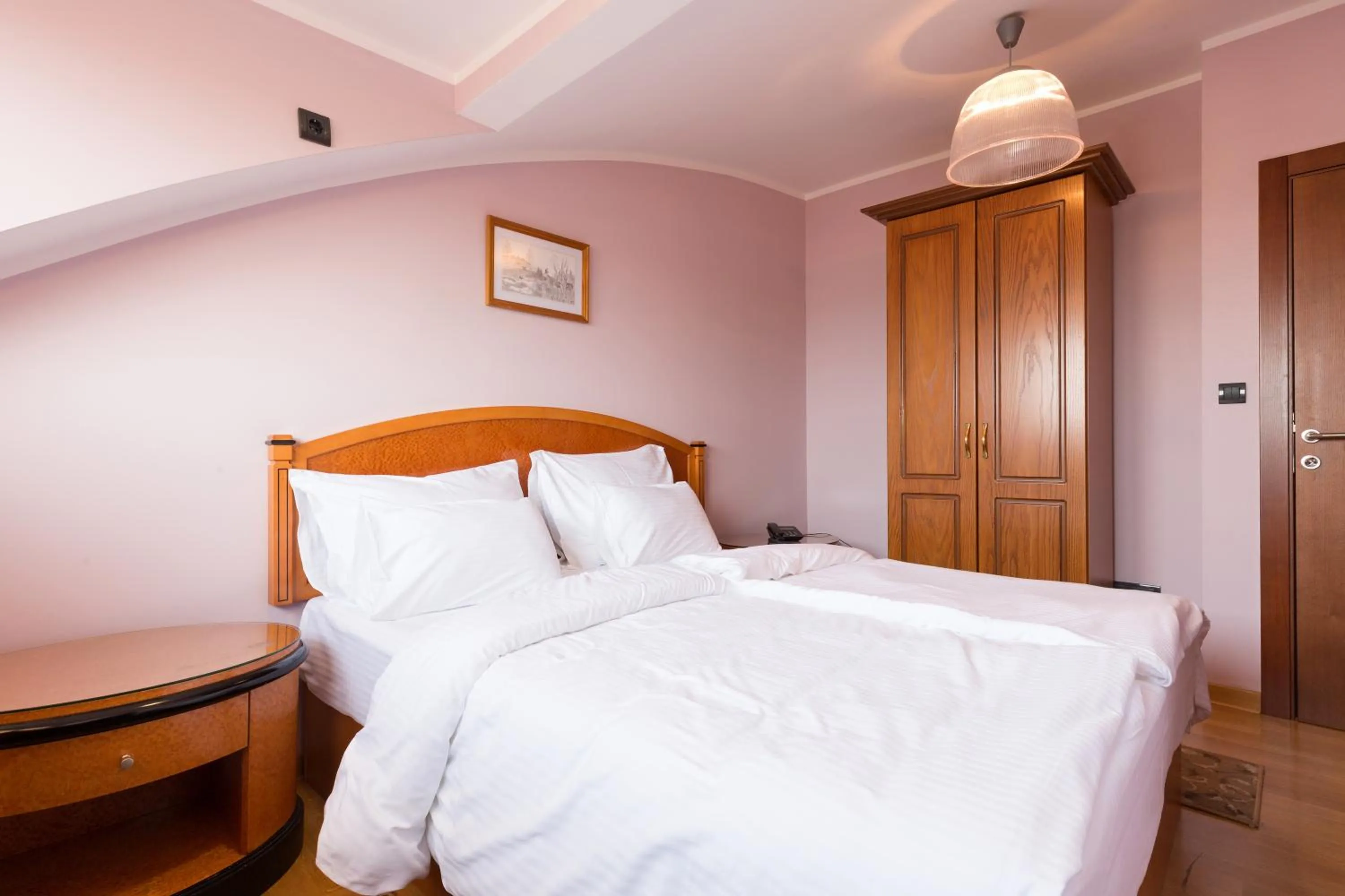 Bedroom, Bed in Hotel Sterling Garni