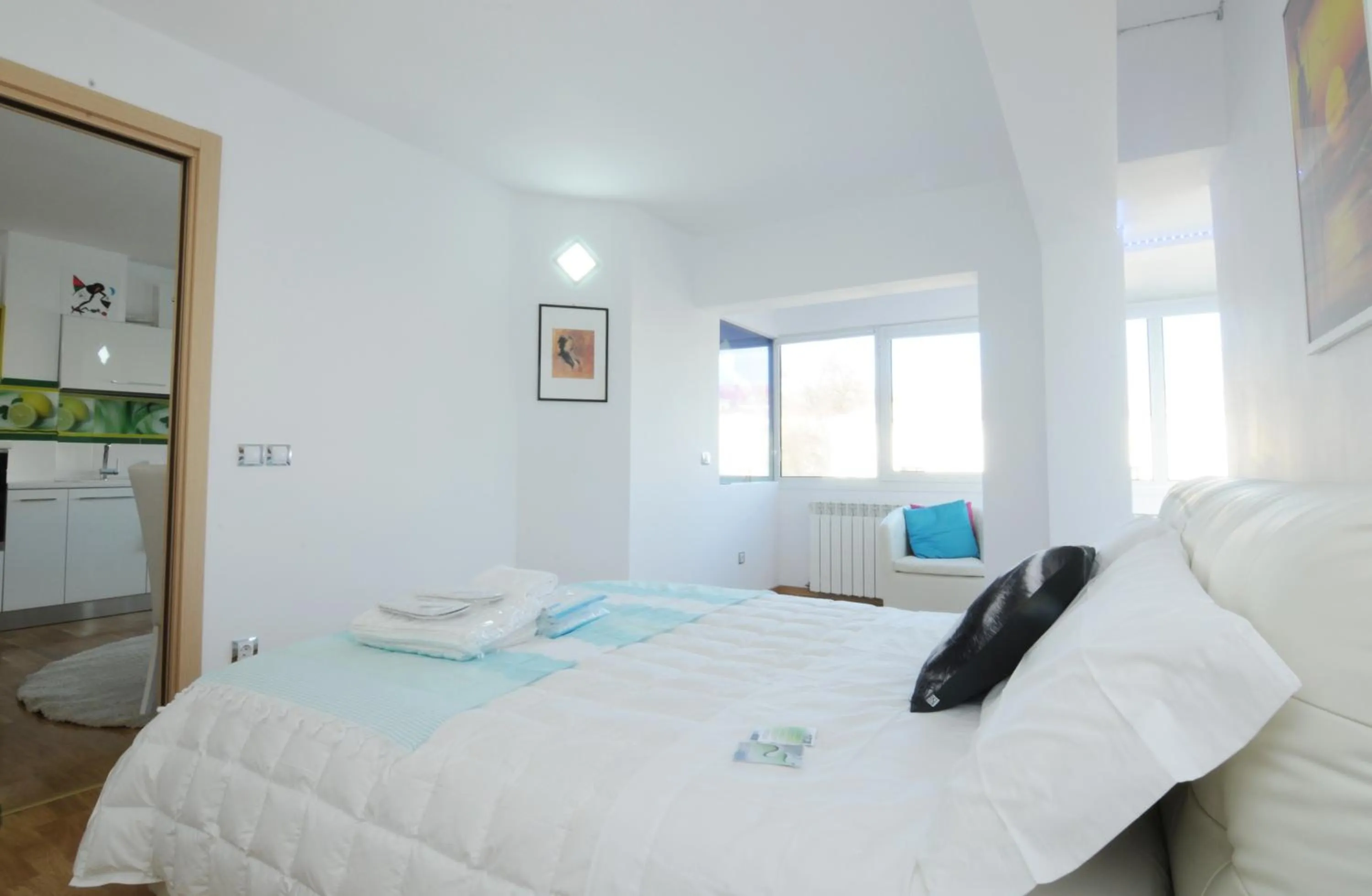 Bed in White Dream Suites