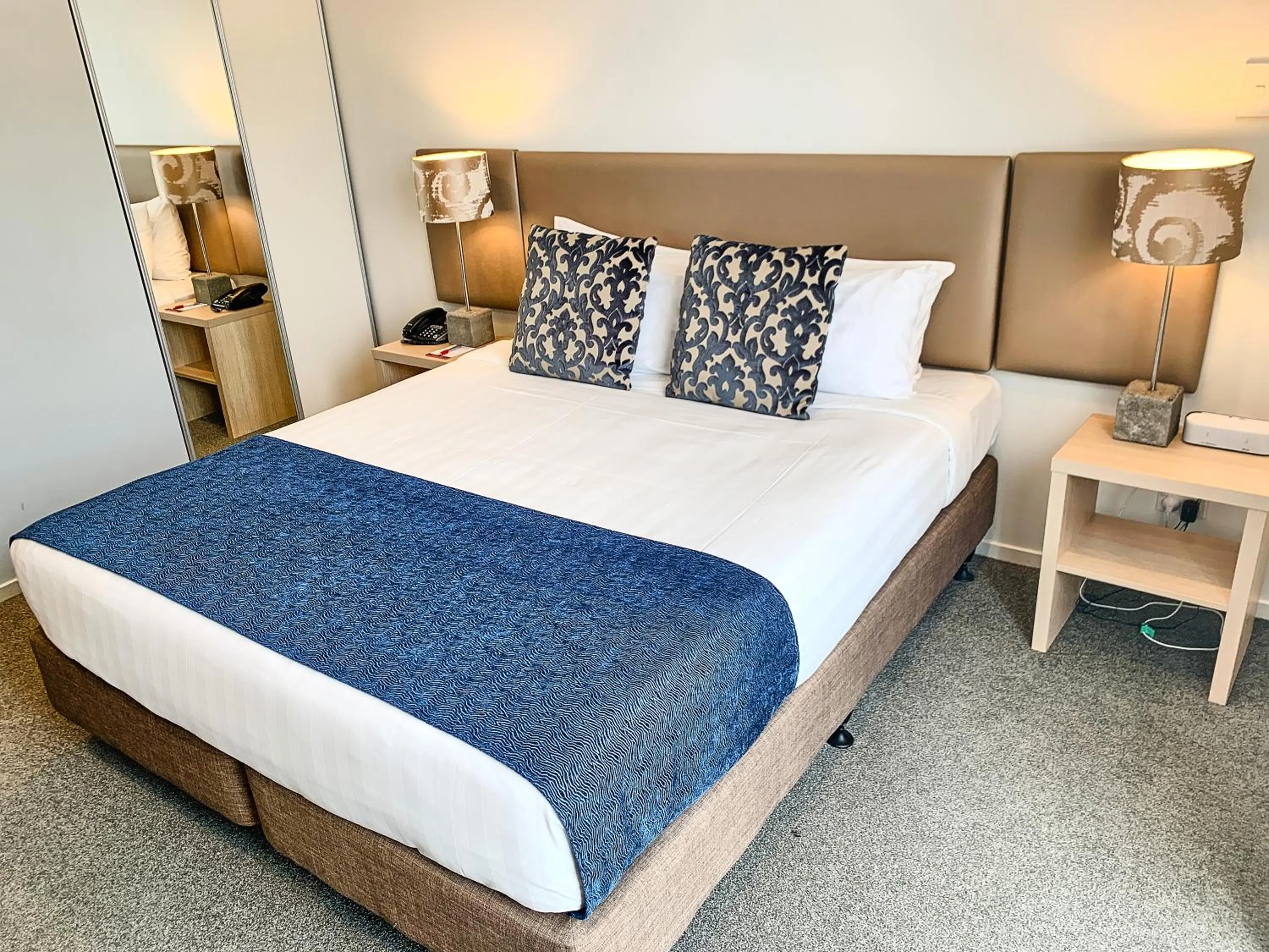 Bed in Ramada Suites by Wyndham Albany