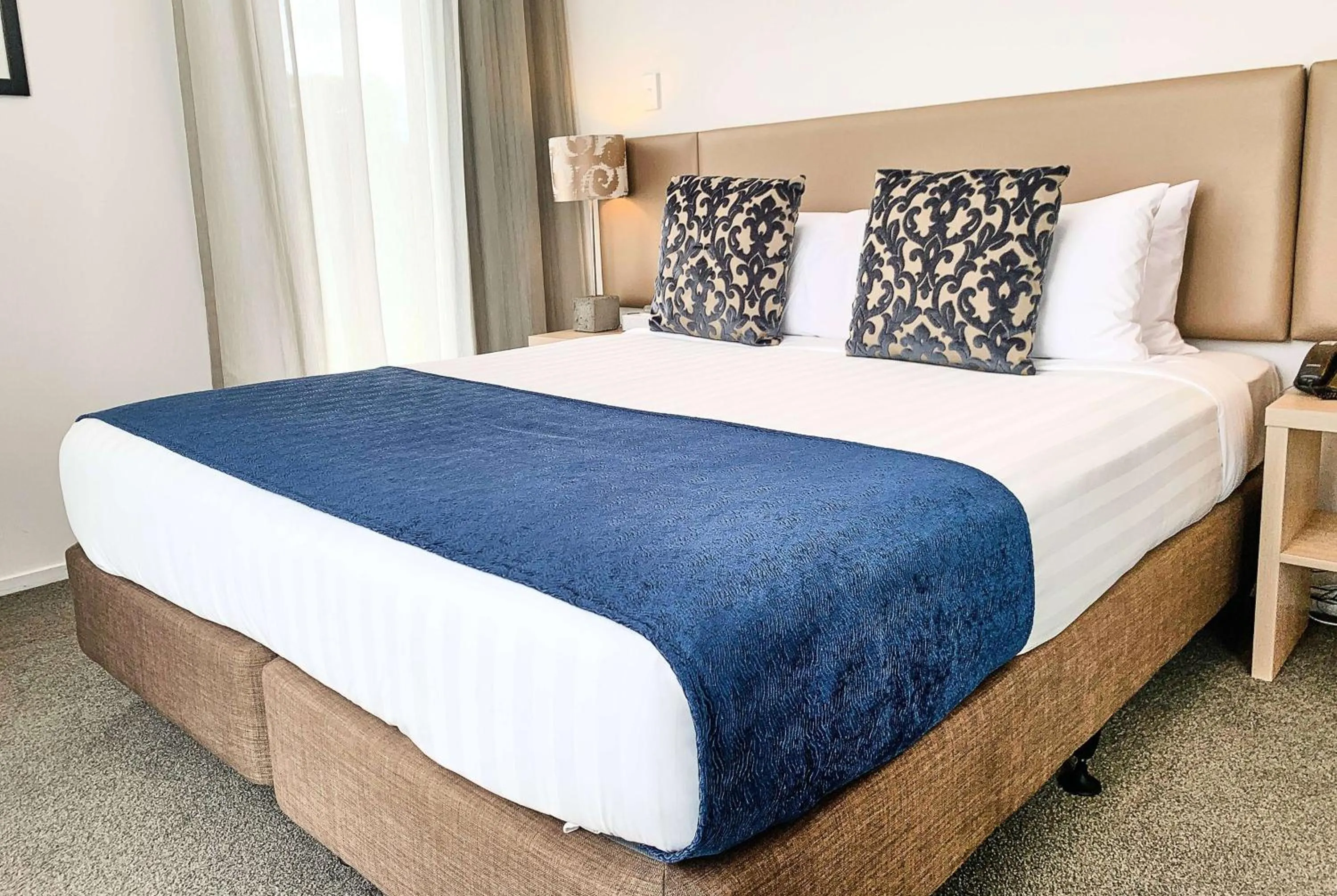 Photo of the whole room, Bed in Ramada Suites by Wyndham Albany