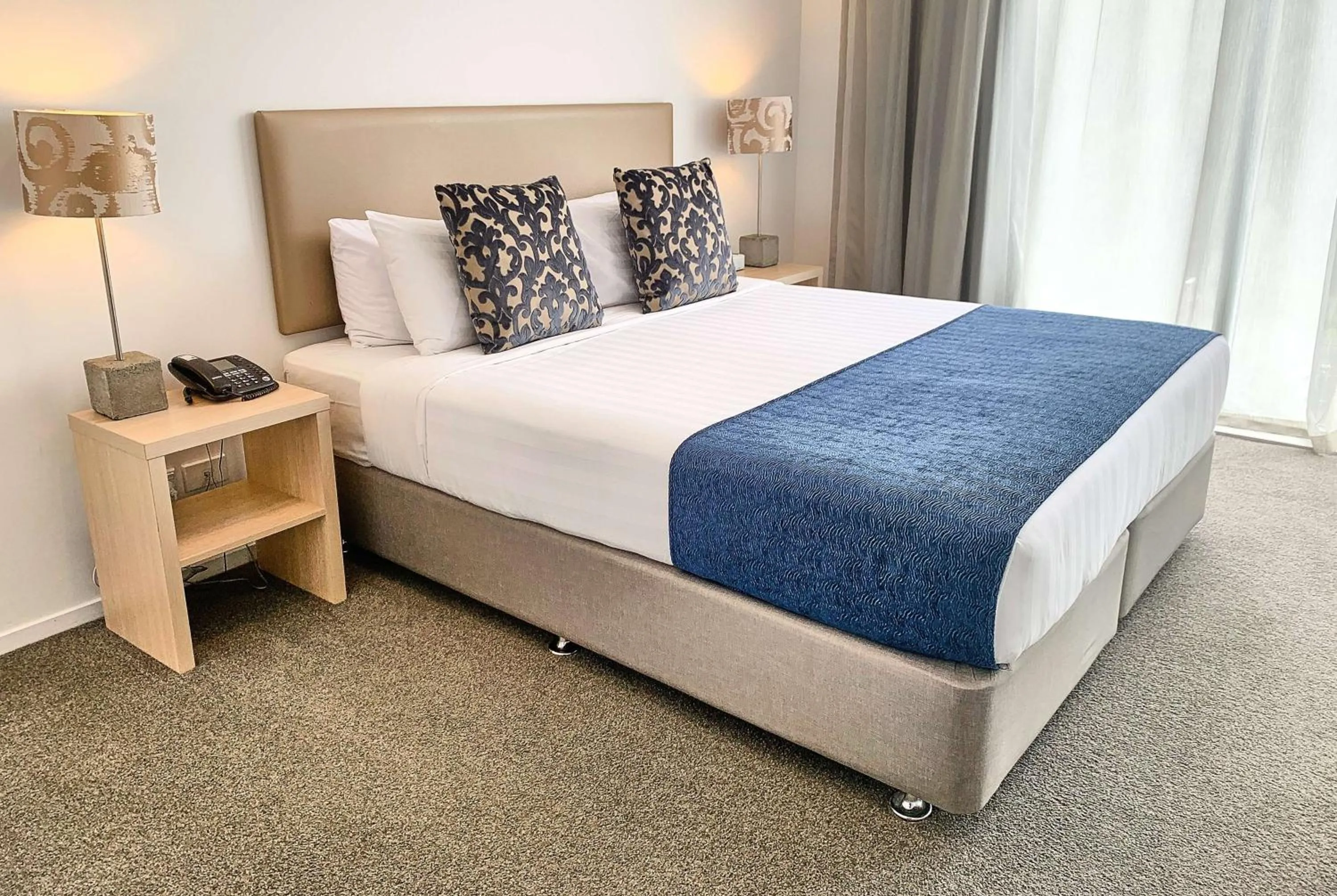 Photo of the whole room, Bed in Ramada Suites by Wyndham Albany