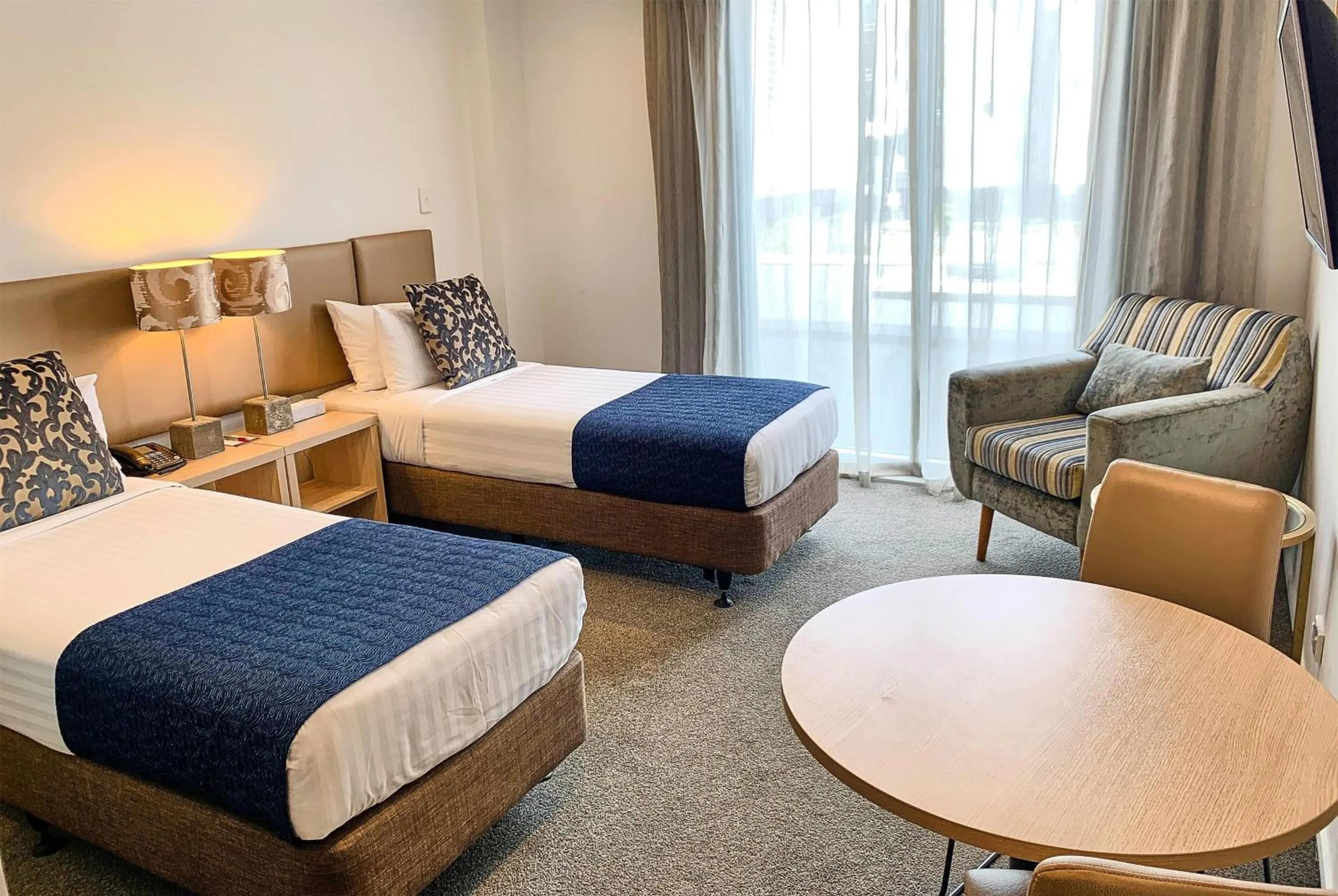 Photo of the whole room, Bed in Ramada Suites by Wyndham Albany