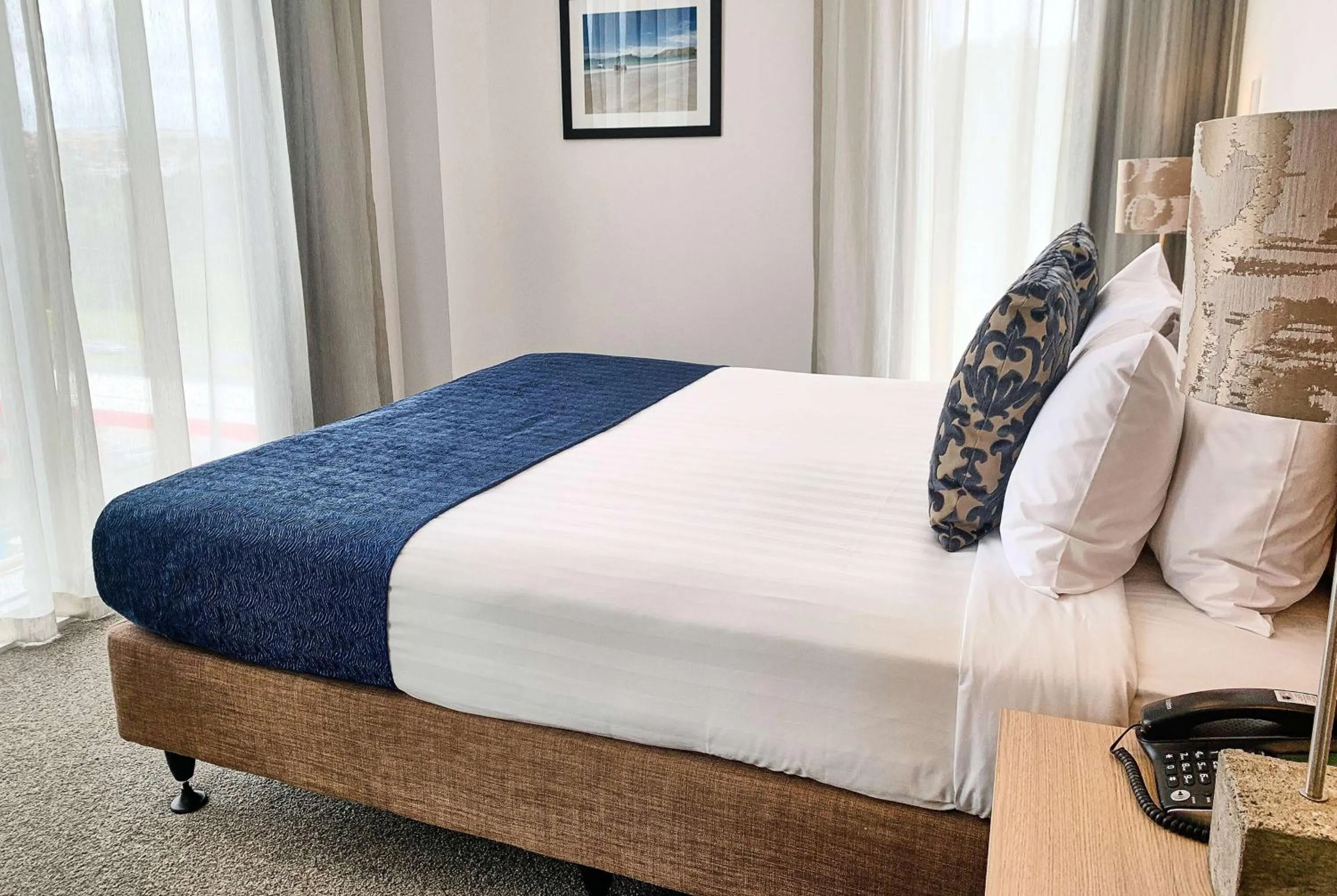 Photo of the whole room, Bed in Ramada Suites by Wyndham Albany