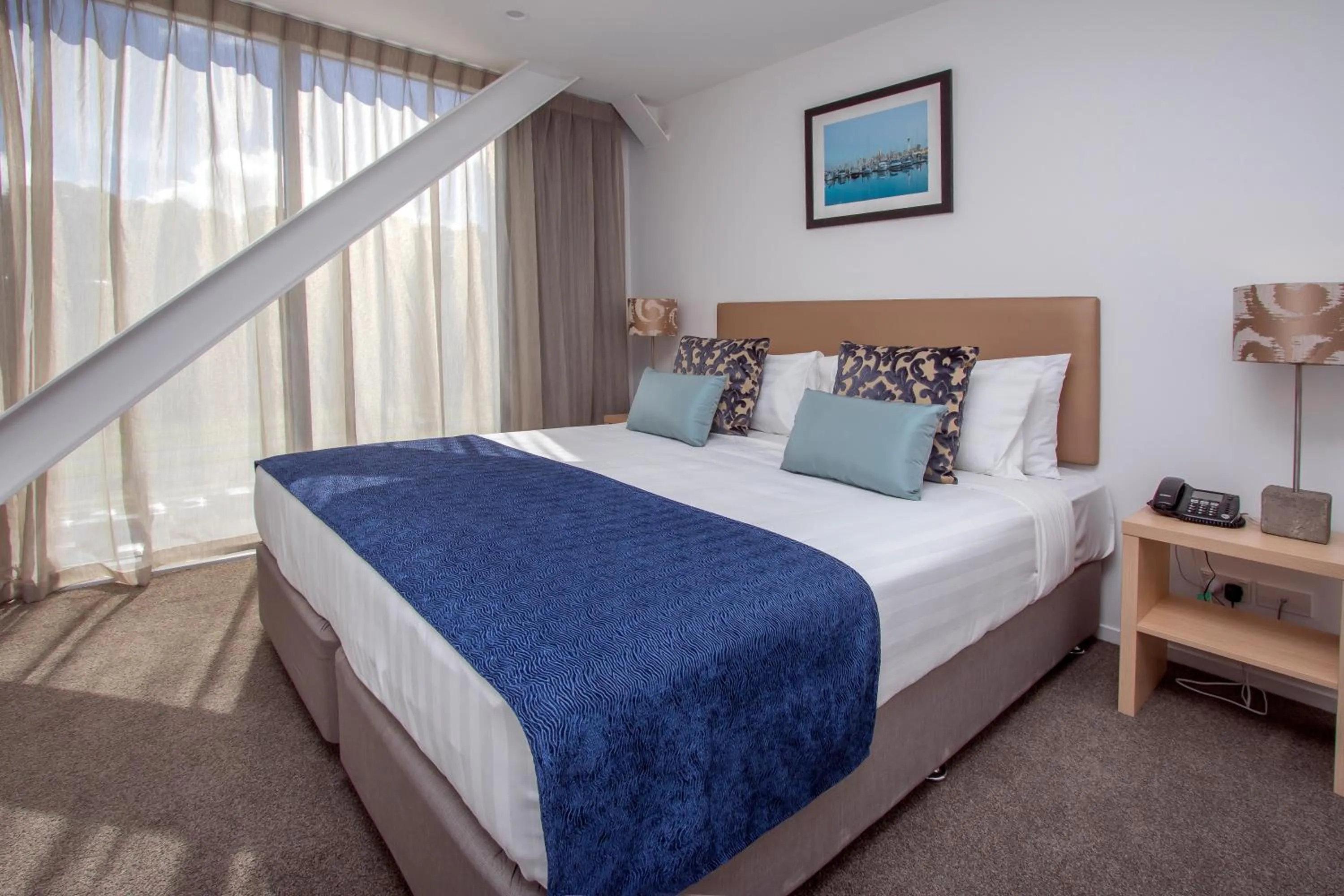 Photo of the whole room, Bed in Ramada Suites by Wyndham Albany