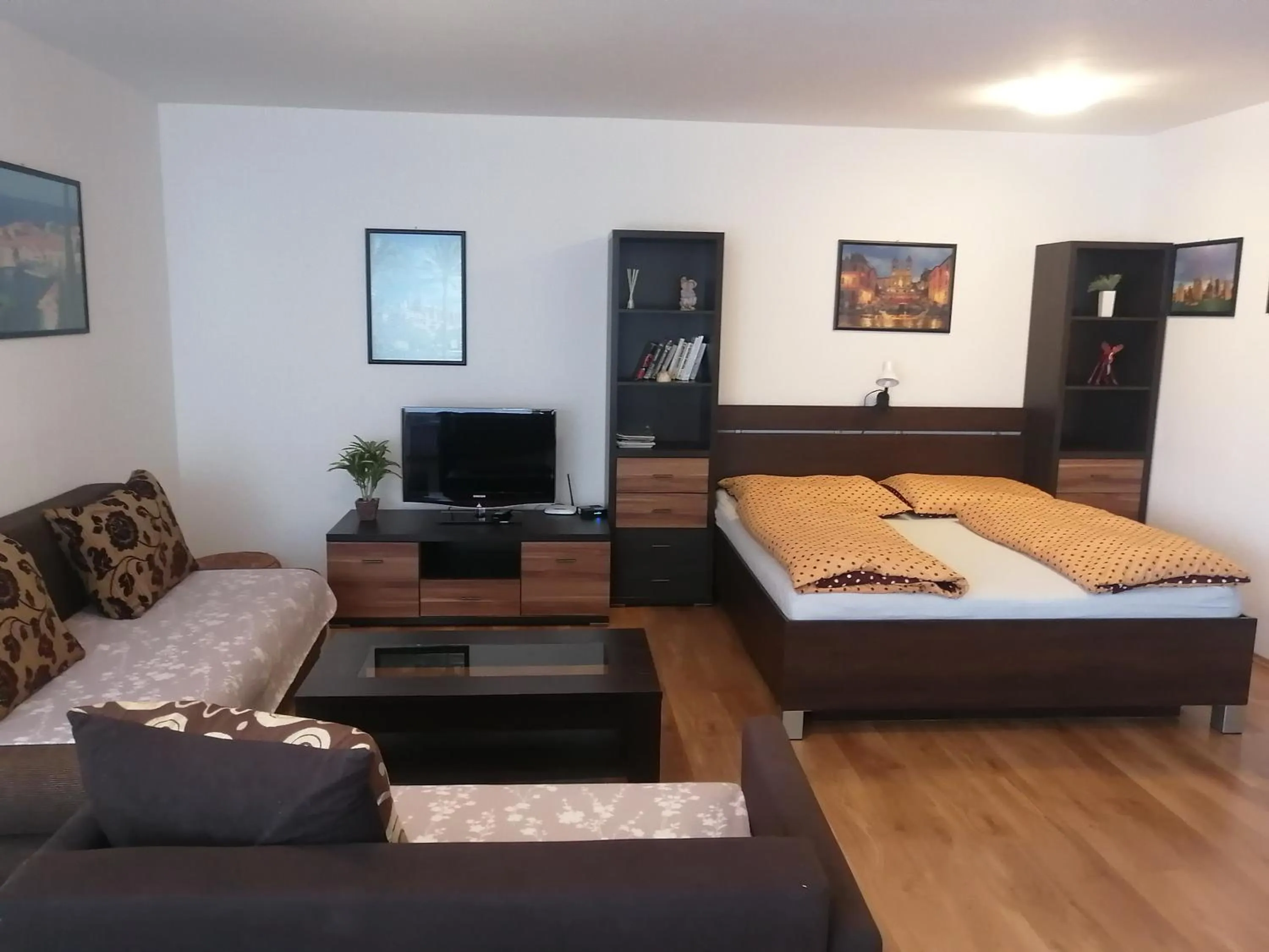 Living room, Bed in Modern city center apartment with private parking