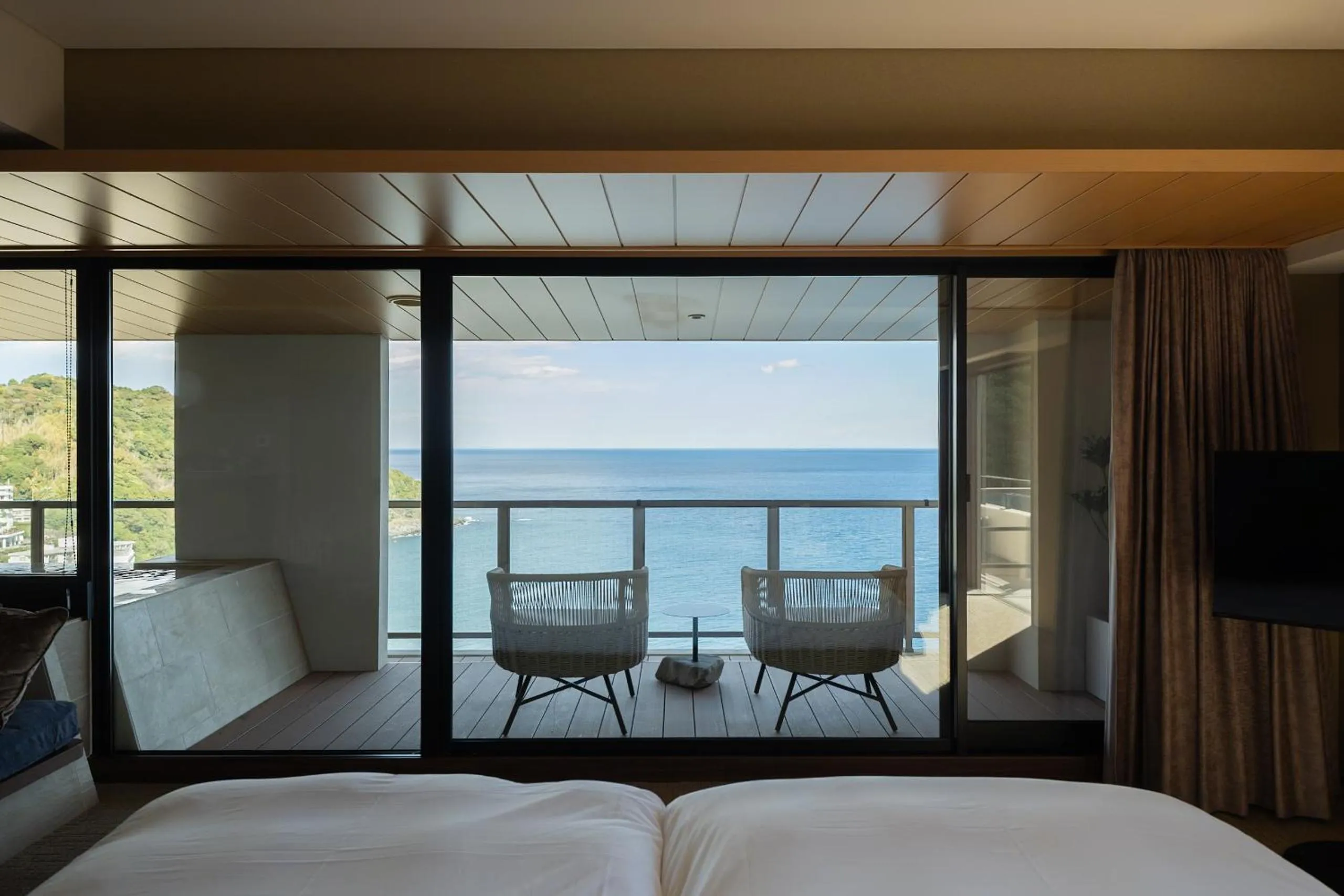 Sea view, Bed in IZU RETREAT by Onko Chishin