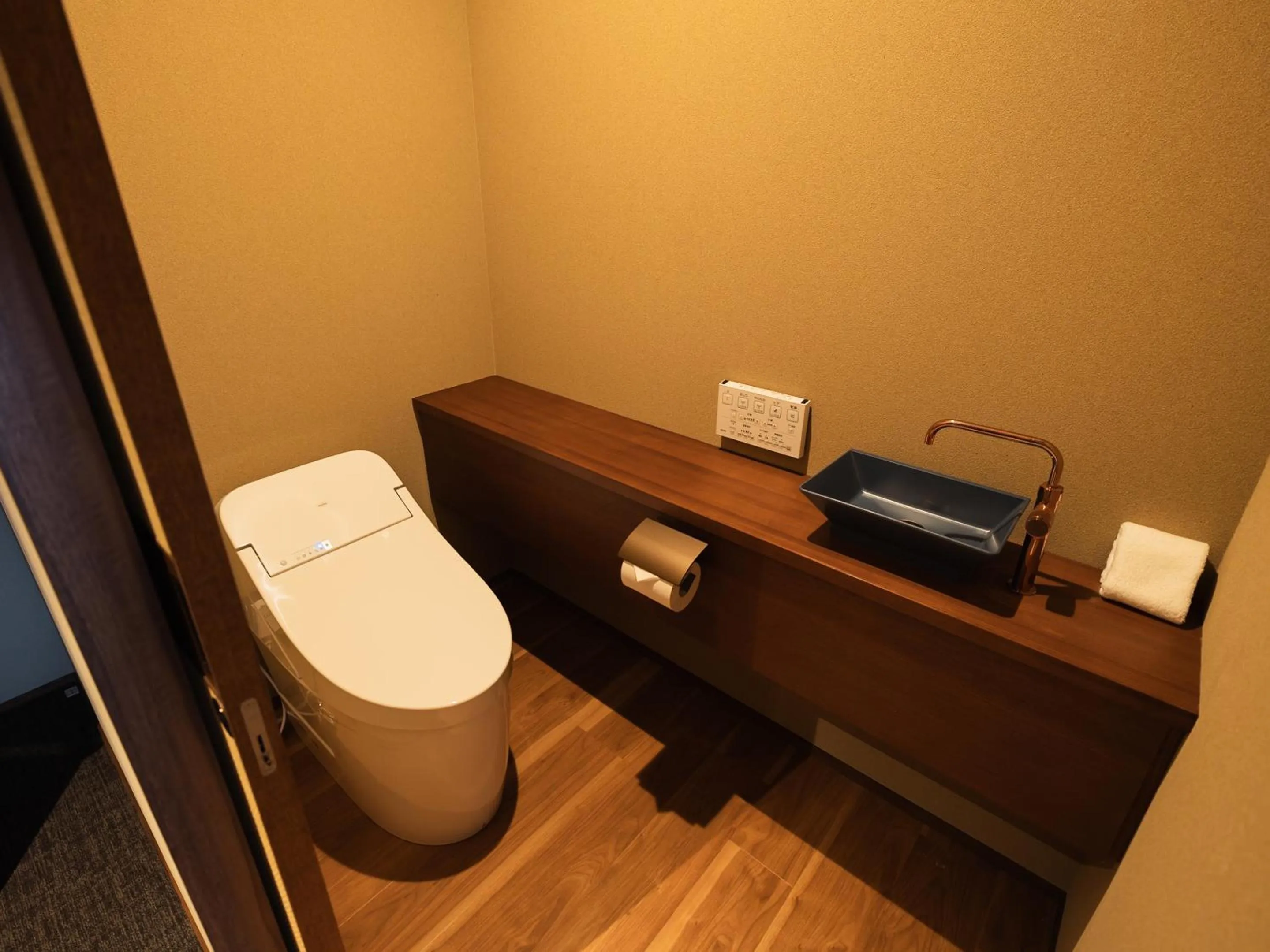 Toilet in IZU RETREAT by Onko Chishin