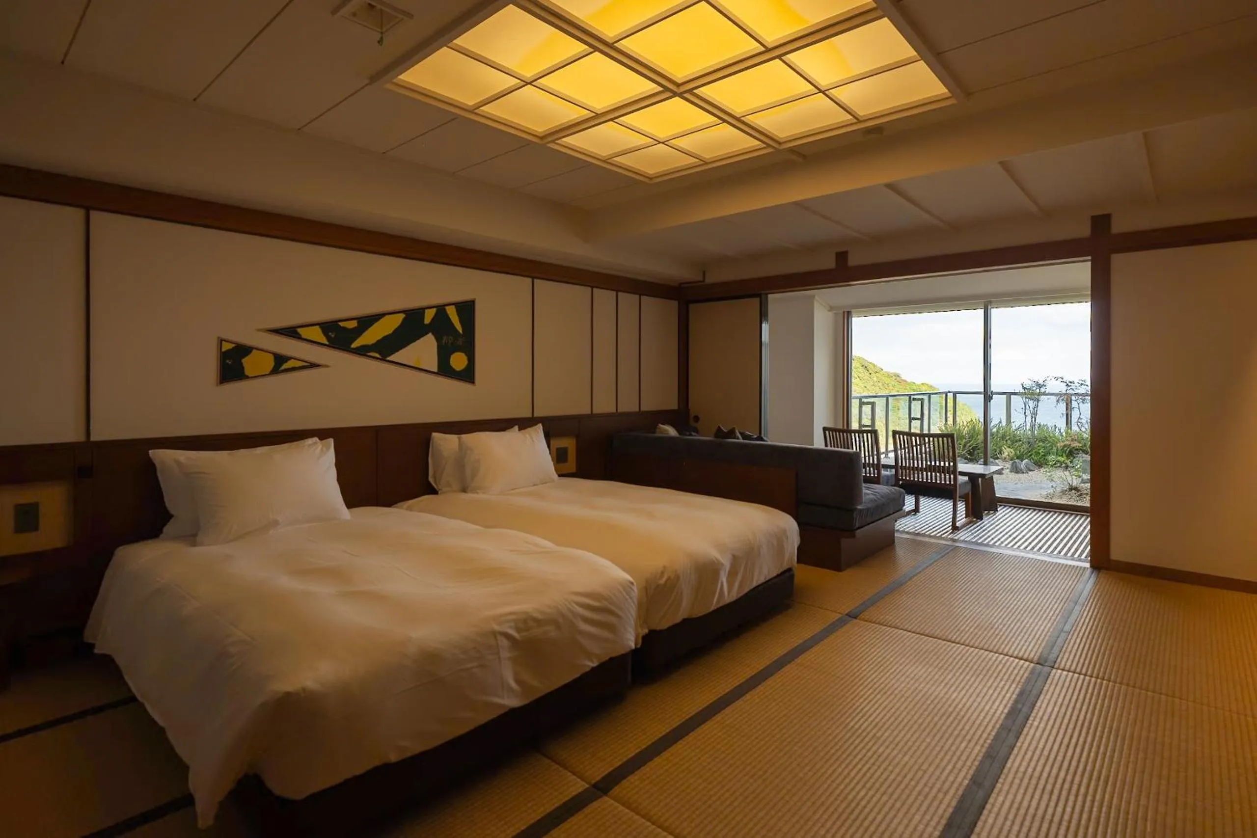 Bed in IZU RETREAT by Onko Chishin