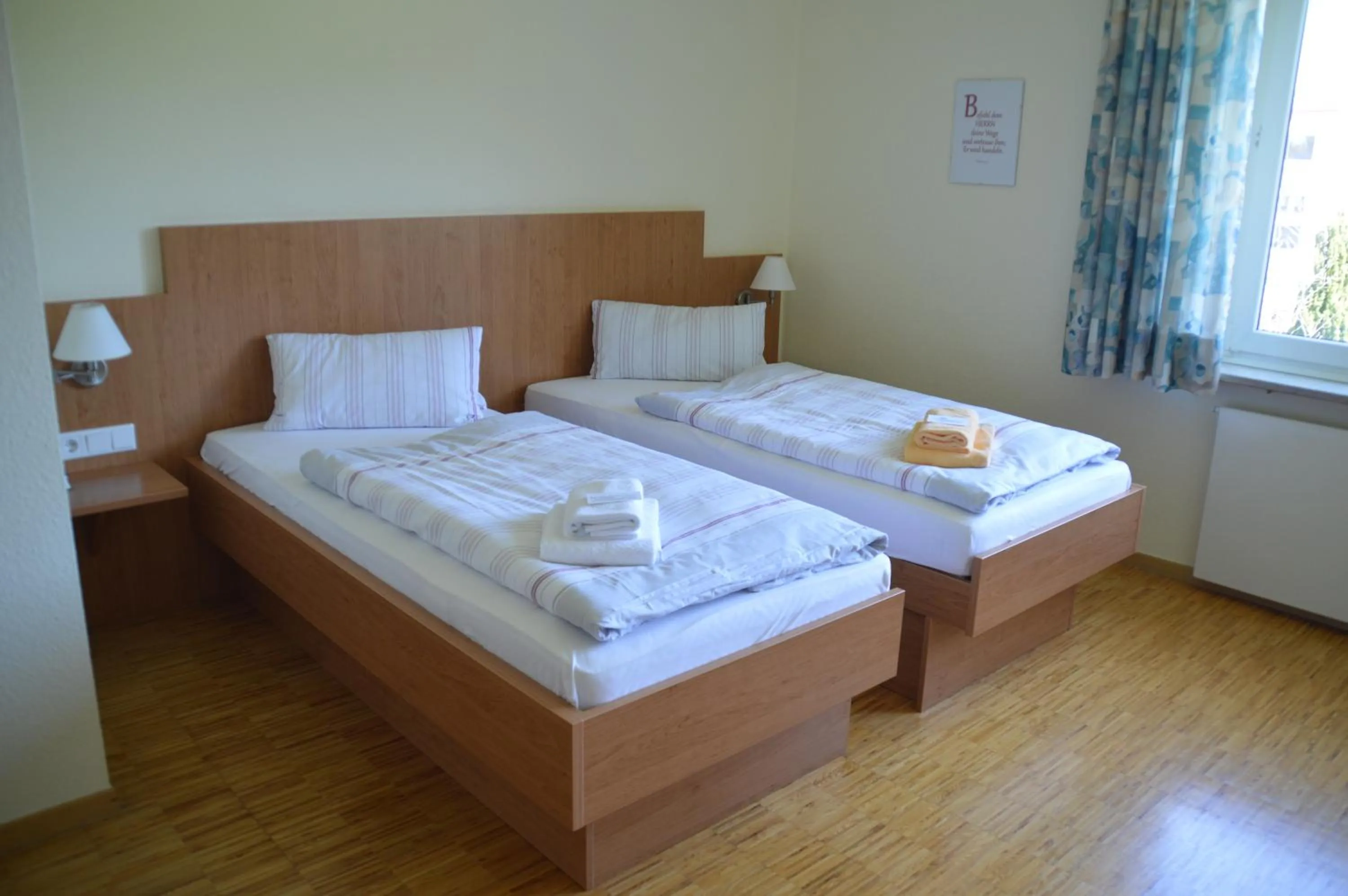 Photo of the whole room, Bed in Das Gästehaus Puschendorf