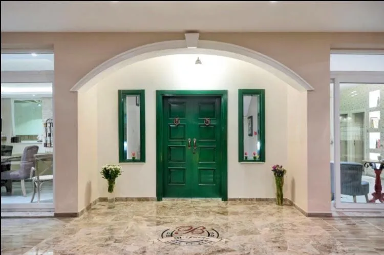 Facade/entrance in B. Equine Range Hotel