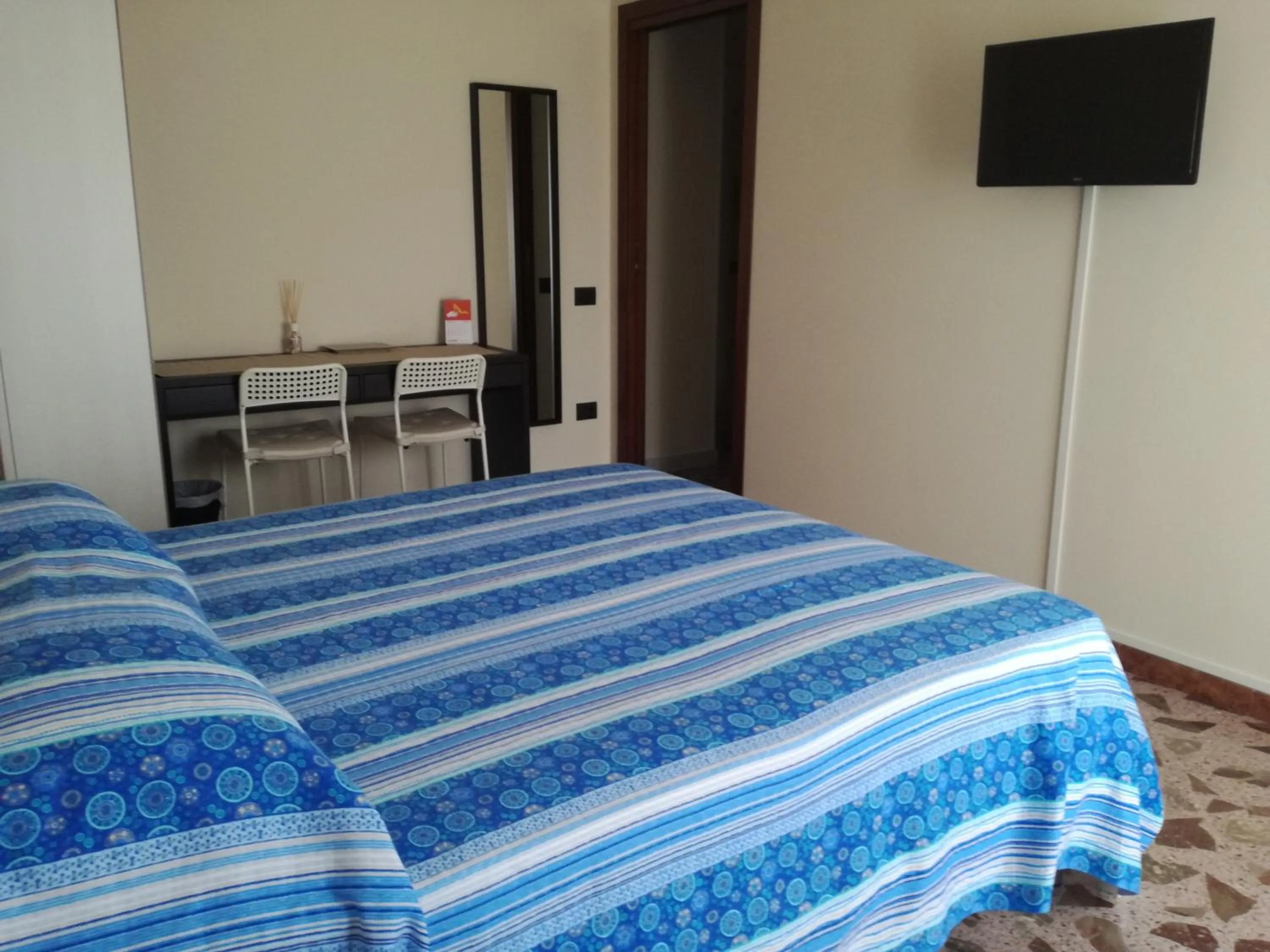 Bedroom in B&B Amina