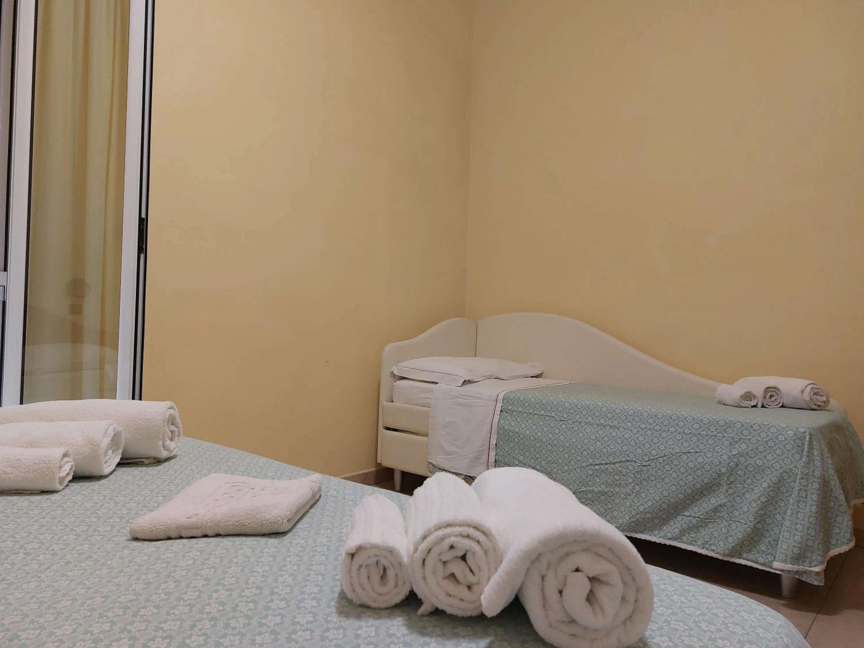 Bed in Hotel Villa Aurora