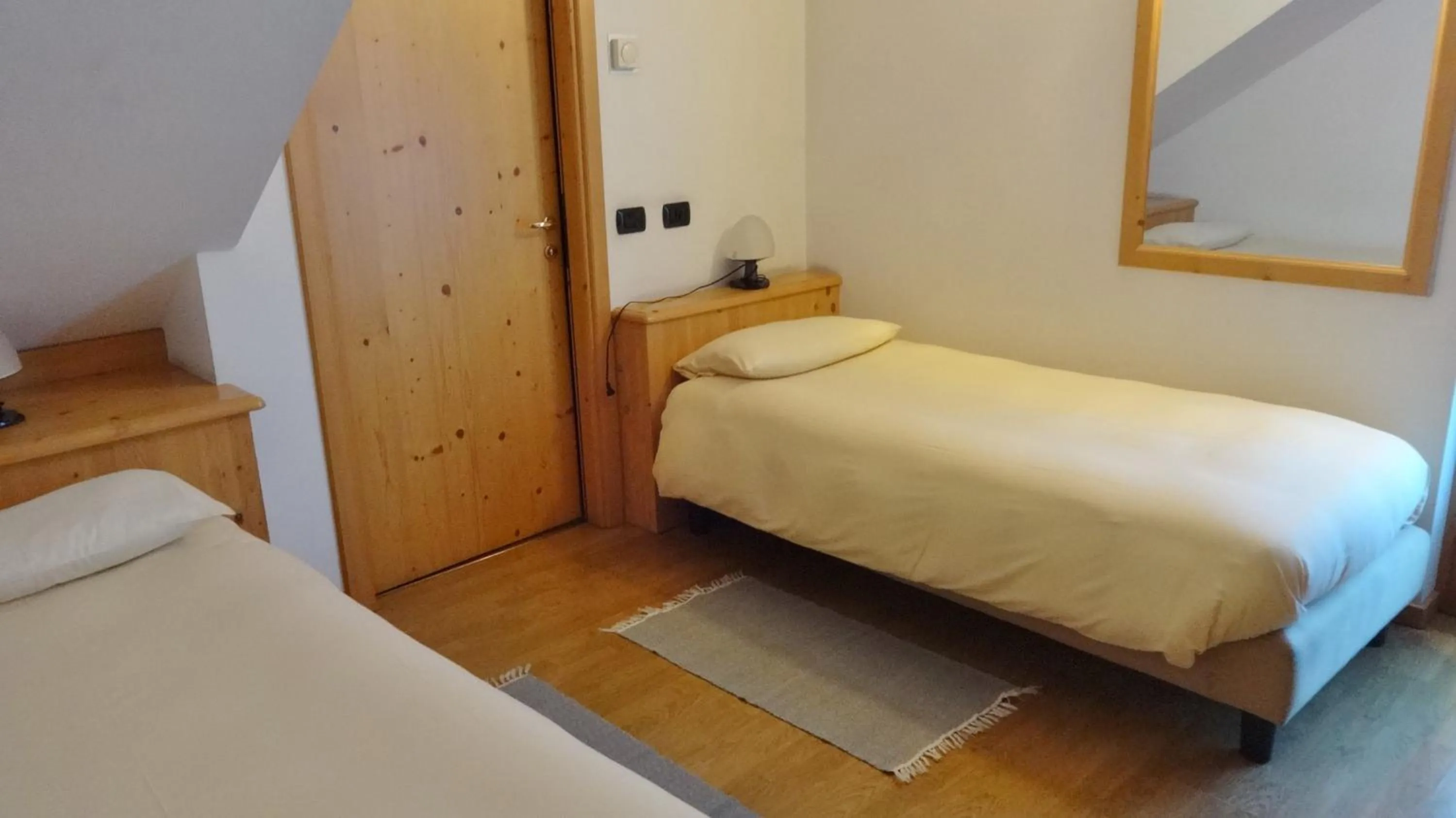 Bed in Hotel Giardino