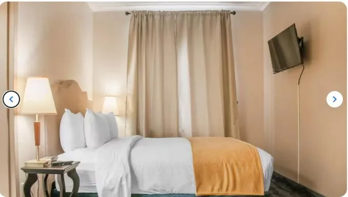 Bed in Empire Suites