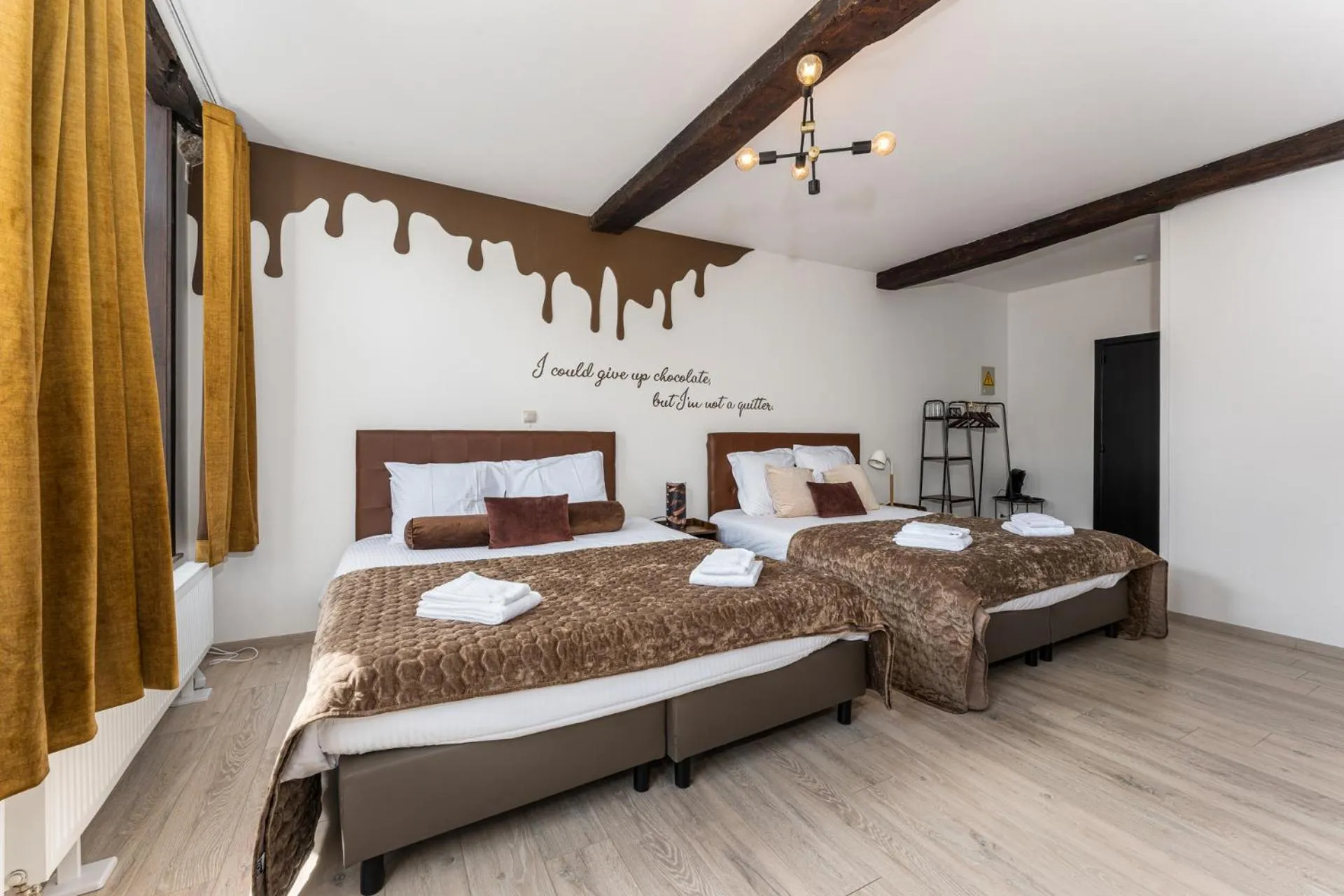 Photo of the whole room, Bed in The Chocolate Suites