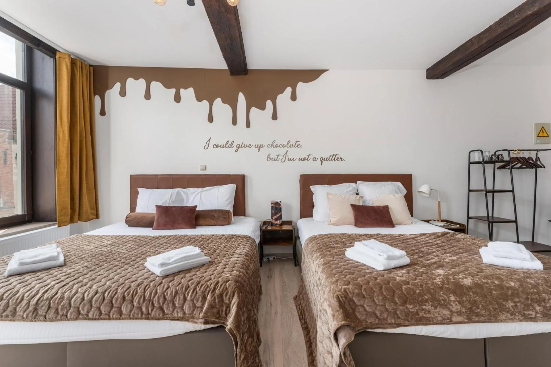 Photo of the whole room, Bed in The Chocolate Suites