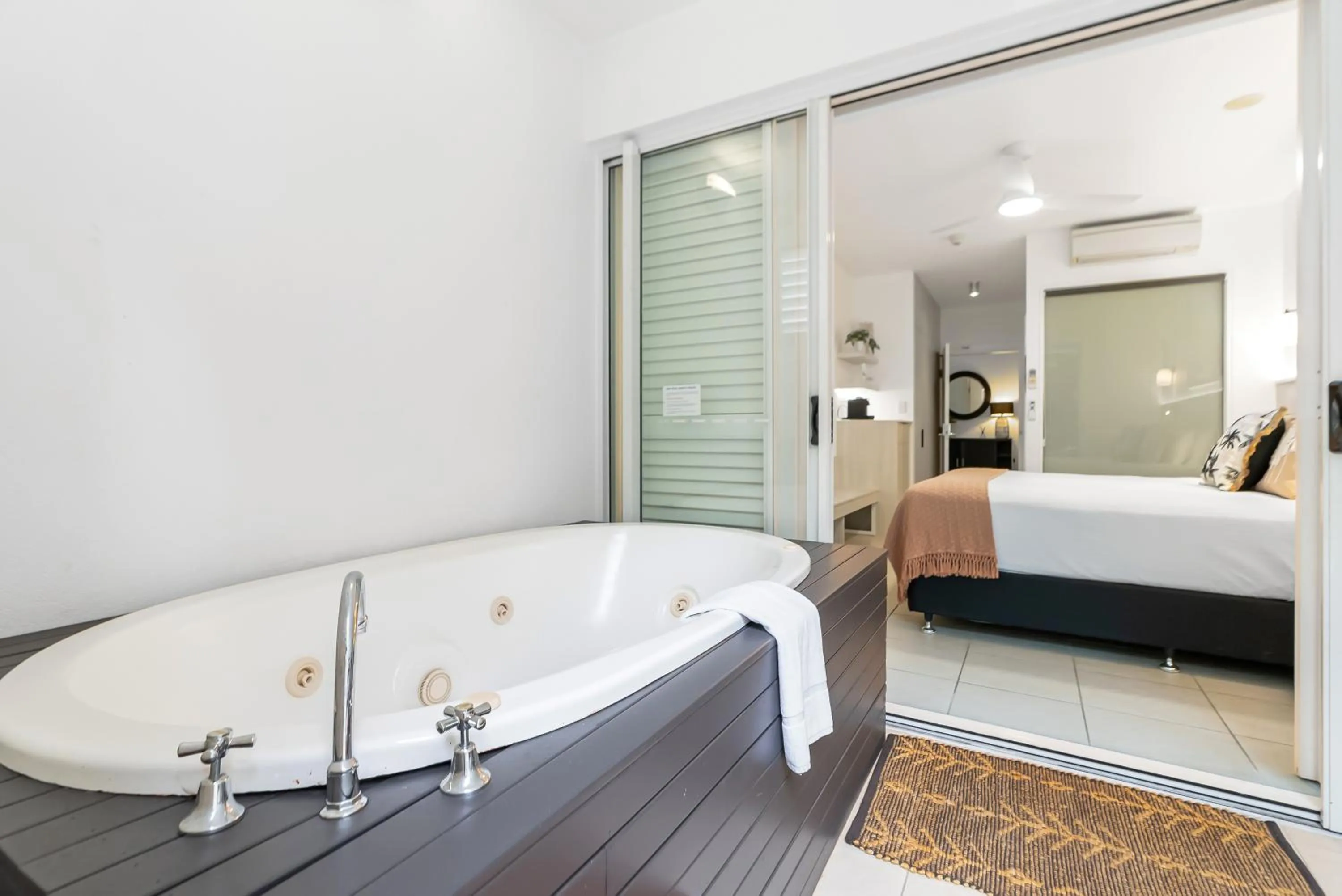 Patio, Bed in Elysium Private Apartments at Beach Club & Spa