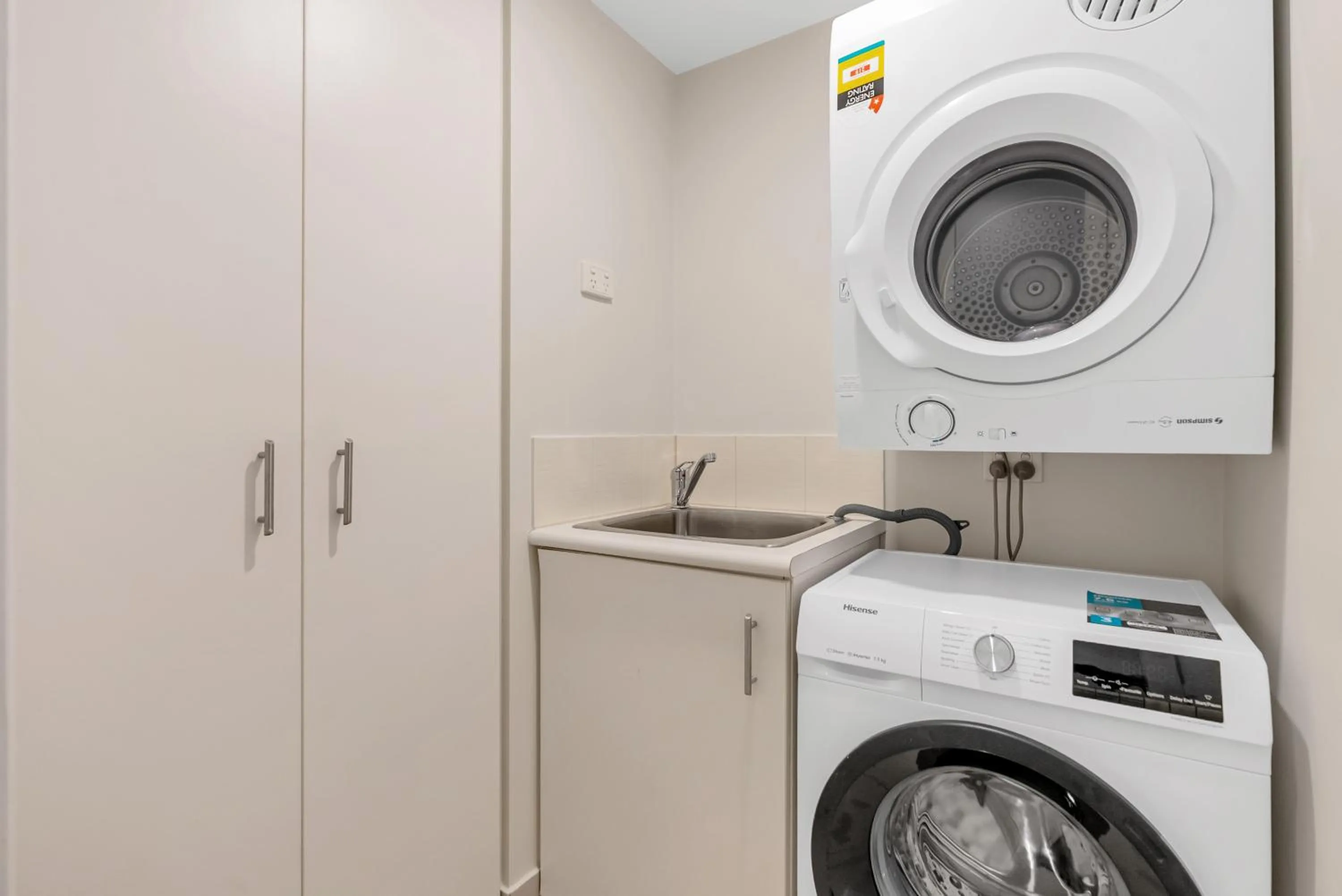 washing machine in Elysium Private Apartments at Beach Club & Spa