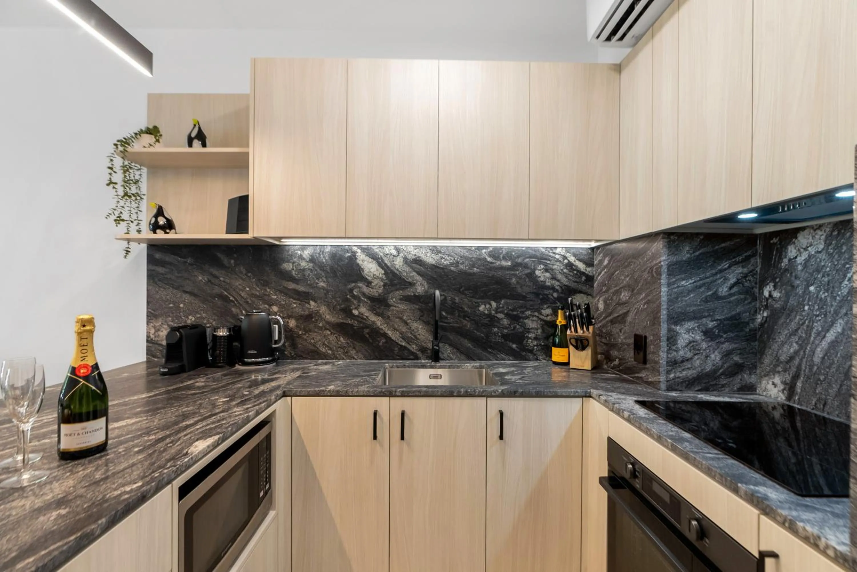 Kitchen or kitchenette in Elysium Private Apartments at Beach Club & Spa