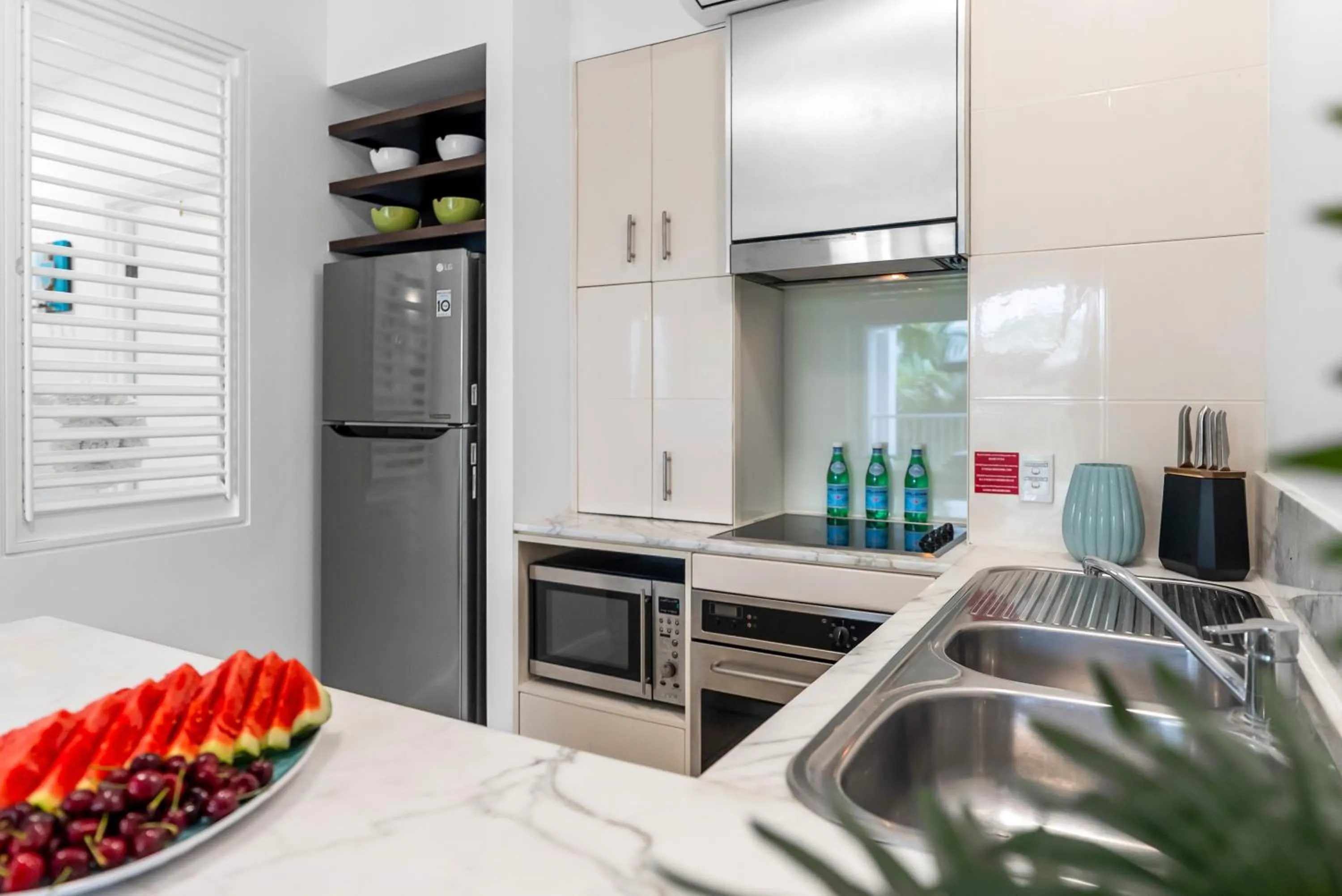 Kitchen or kitchenette in Elysium Private Apartments at Beach Club & Spa