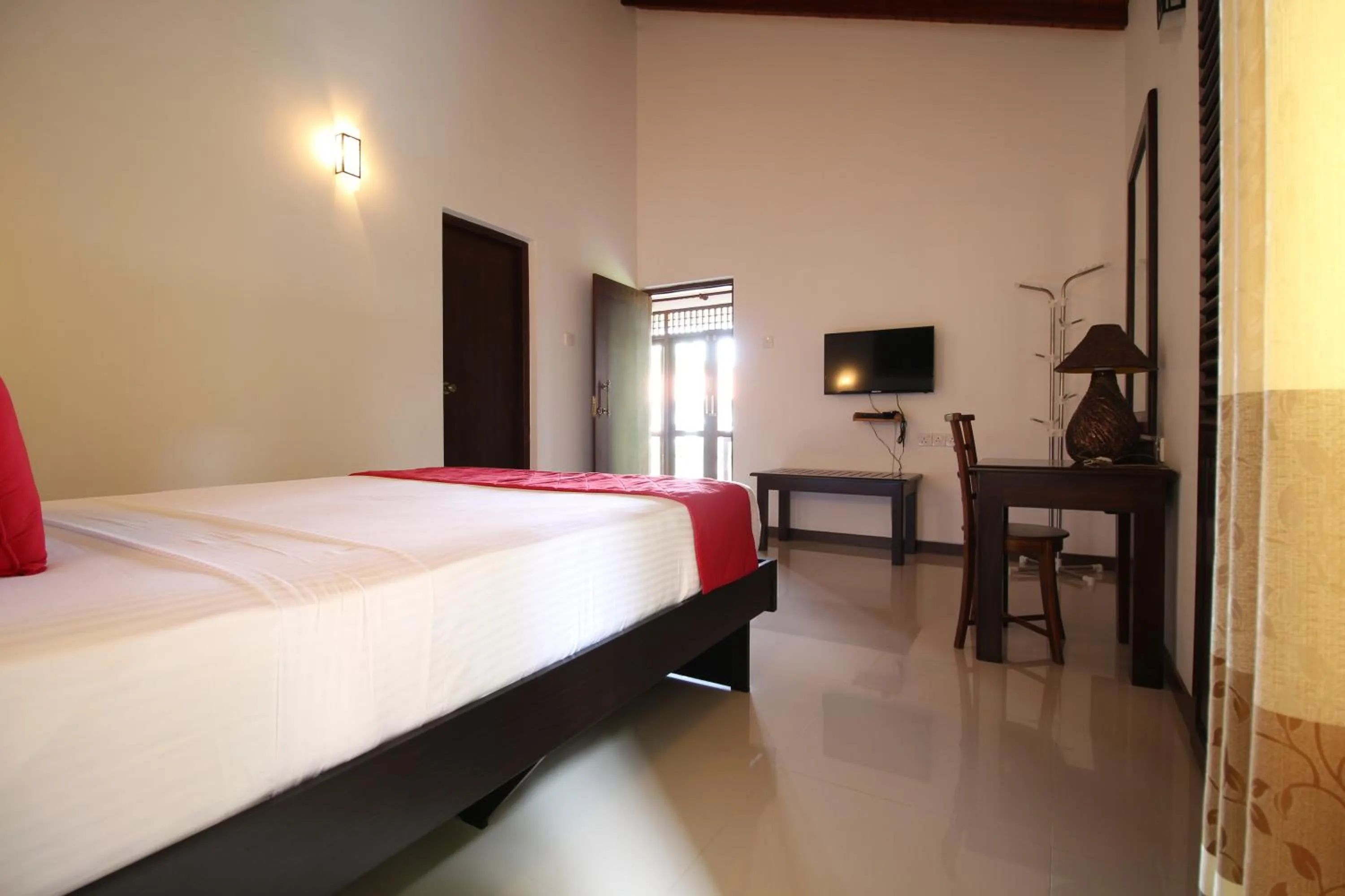 Bed in River Breeze Villa Bentota