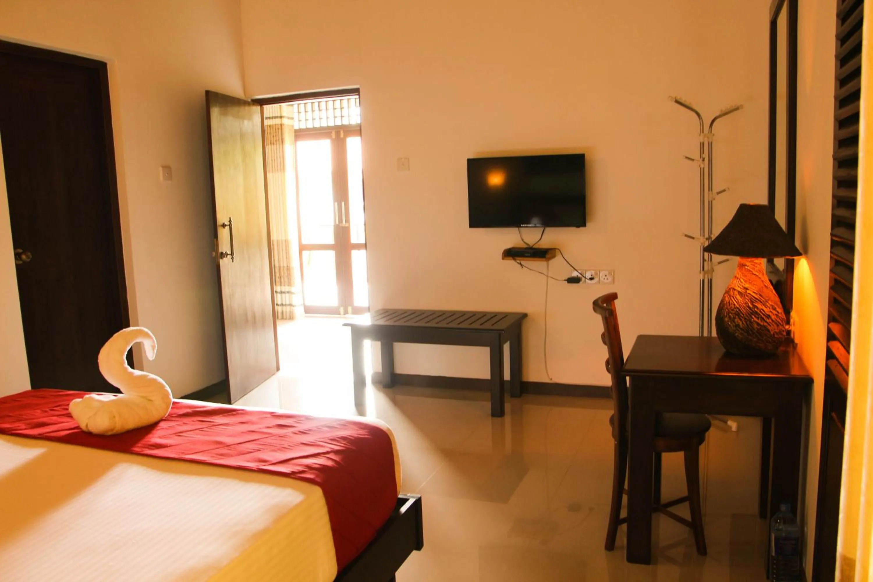 Photo of the whole room, TV/Entertainment Center in River Breeze Villa Bentota