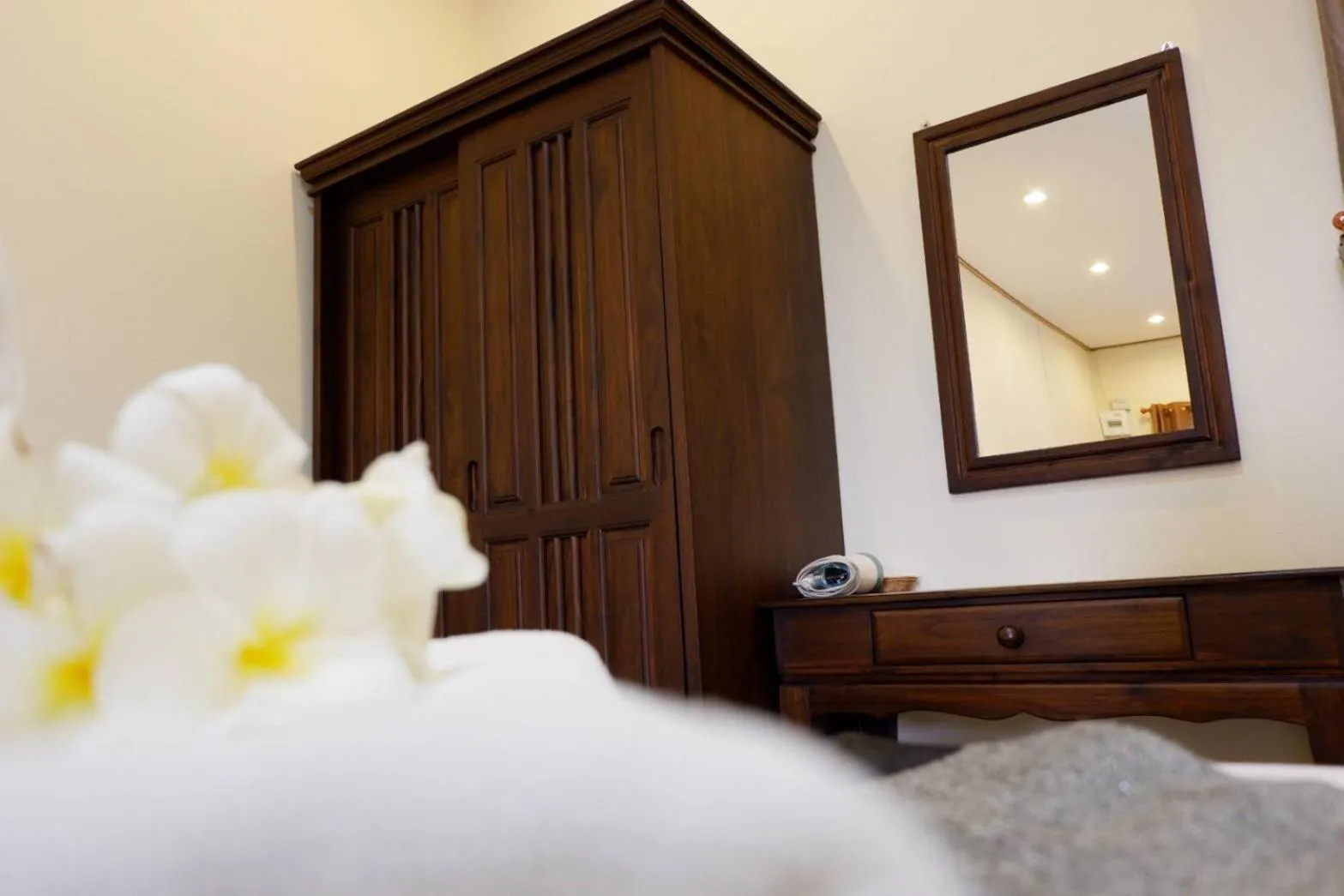 Bed in NanBaanKhun Hotel