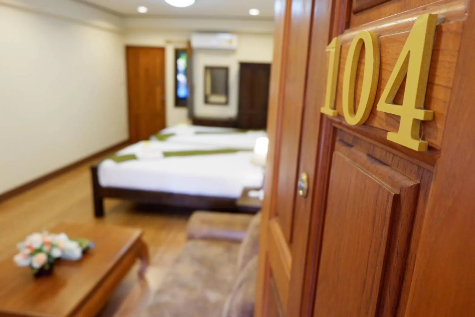 Bed in NanBaanKhun Hotel