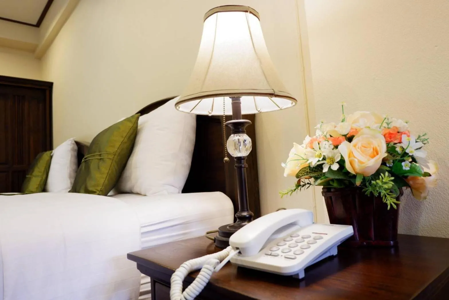 Bed in NanBaanKhun Hotel