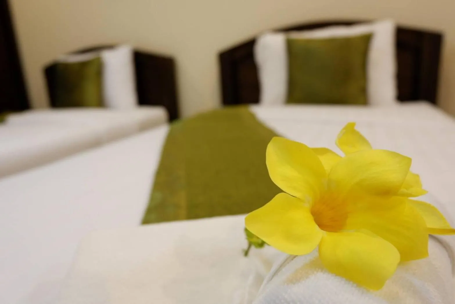 Bed in NanBaanKhun Hotel