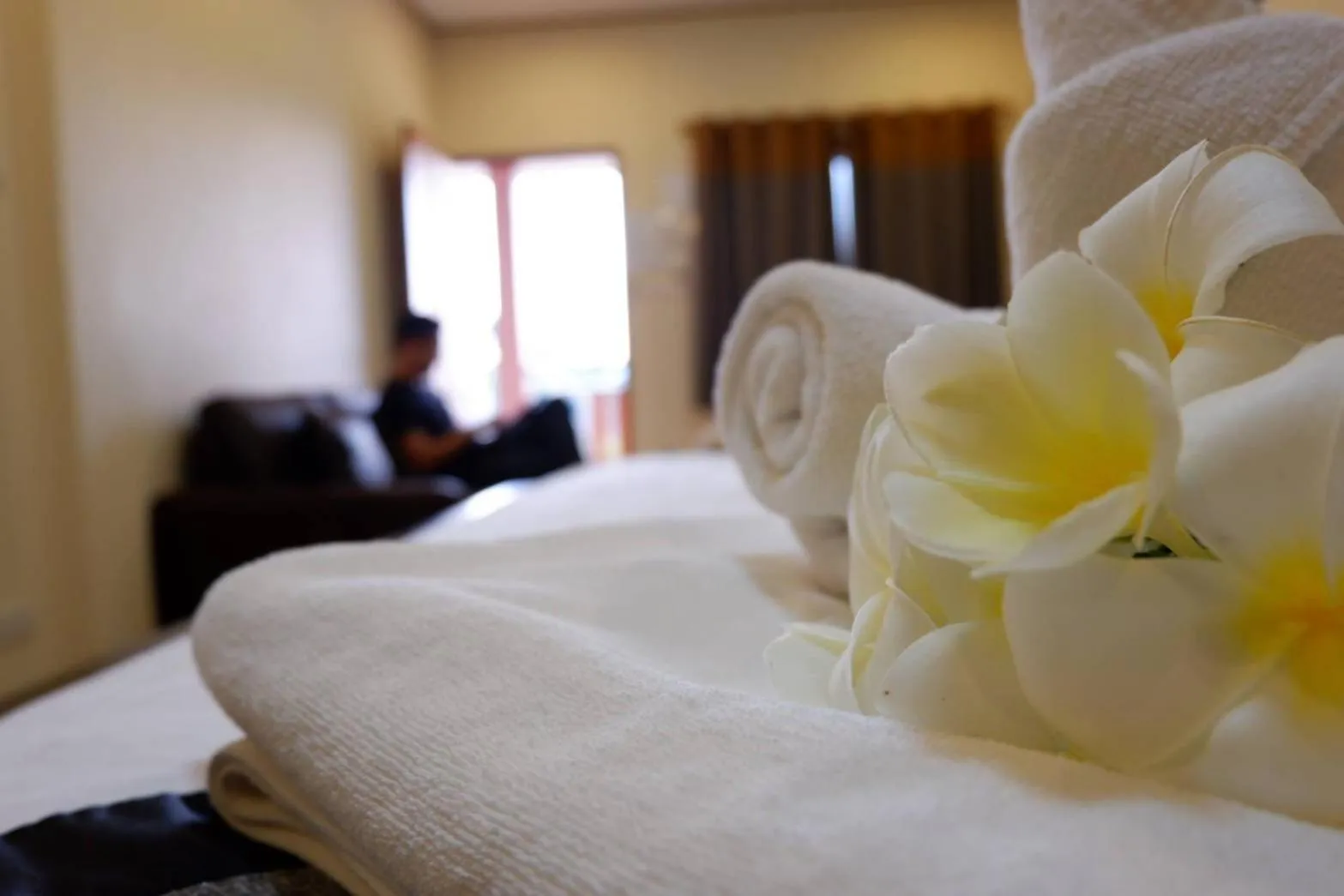 Bed in NanBaanKhun Hotel