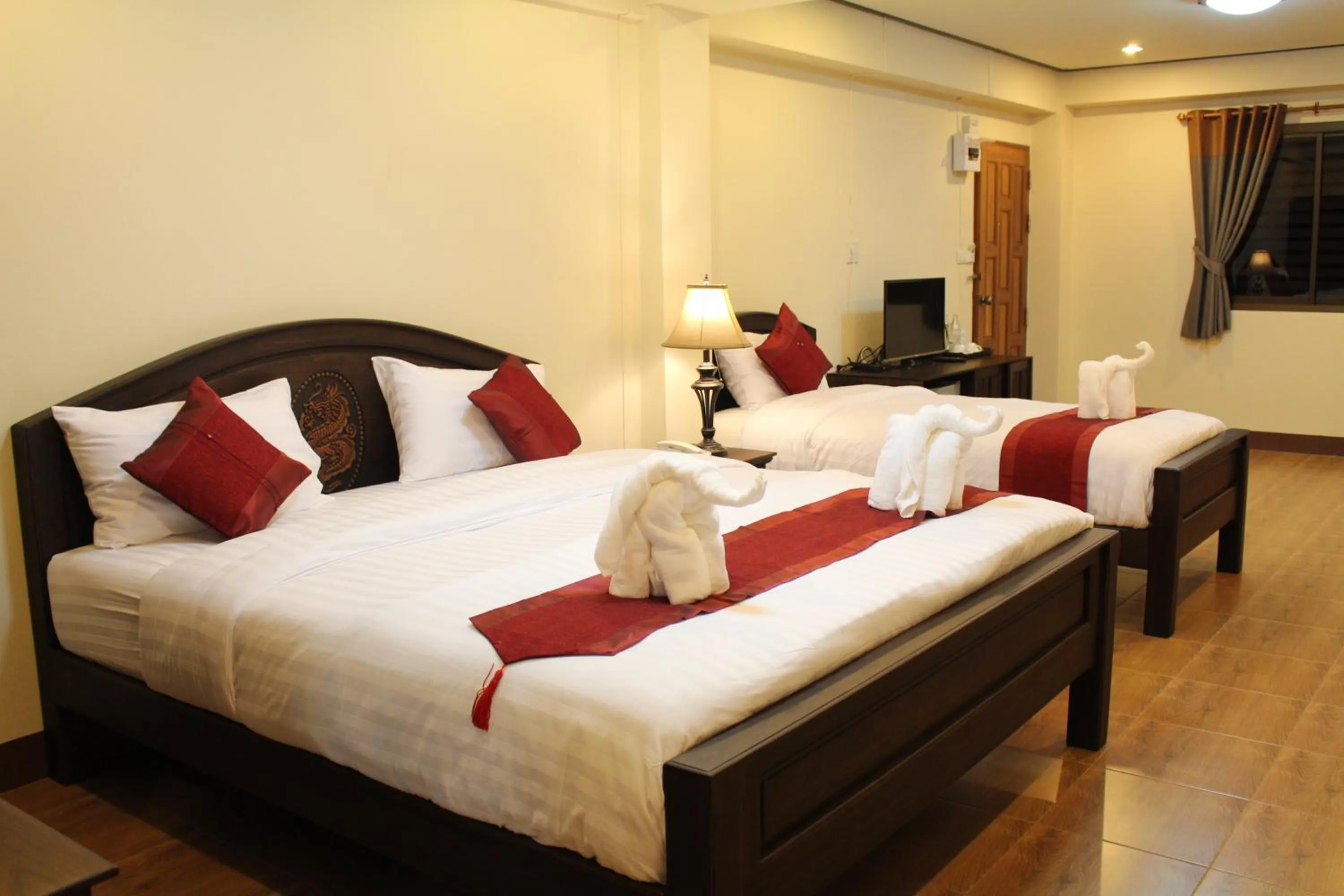 Bedroom, Bed in NanBaanKhun Hotel