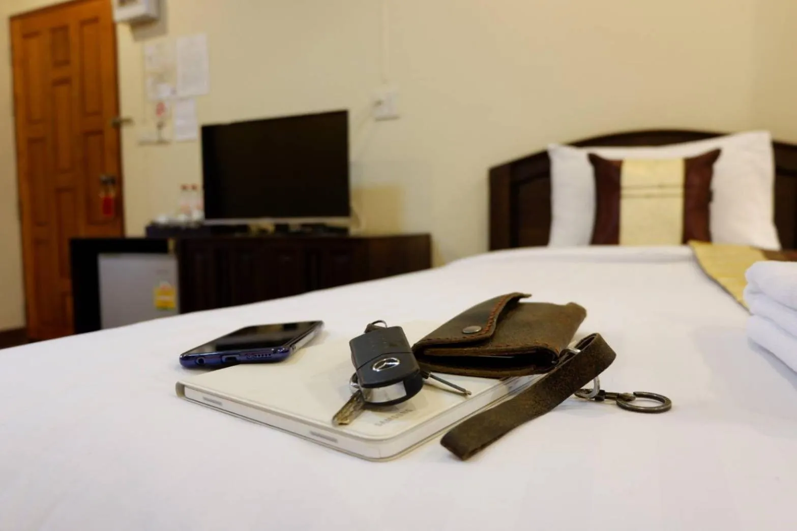 Bed in NanBaanKhun Hotel