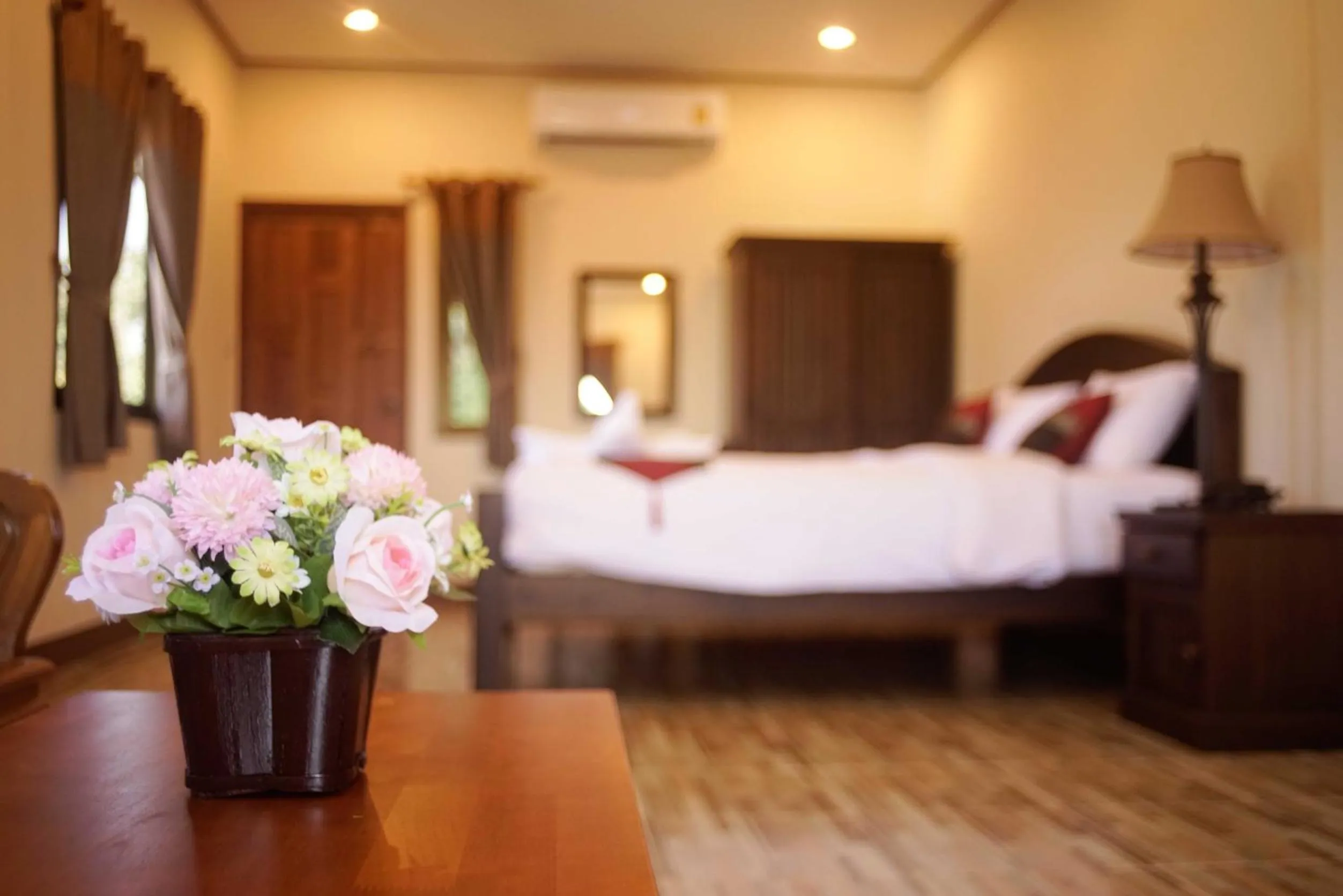 Bed in NanBaanKhun Hotel